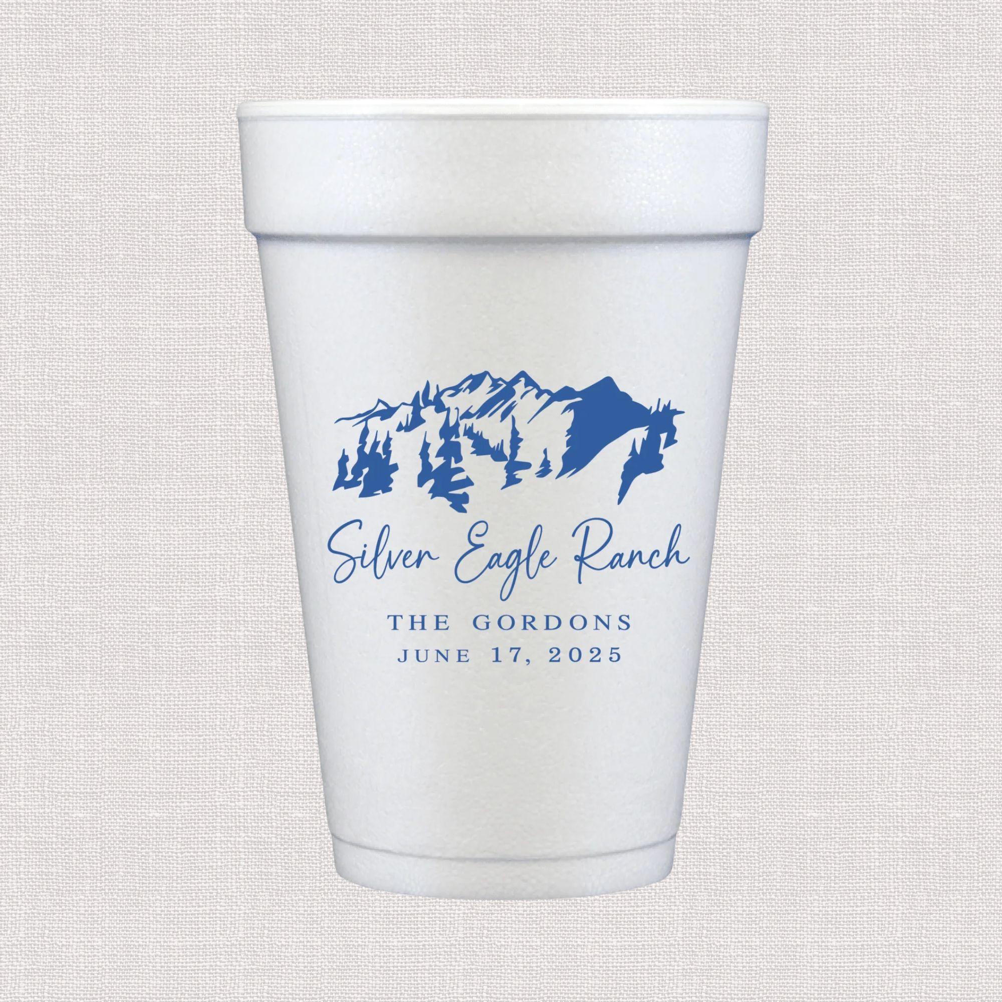 White foam cup with blue mountain ranch design and personalized wedding text