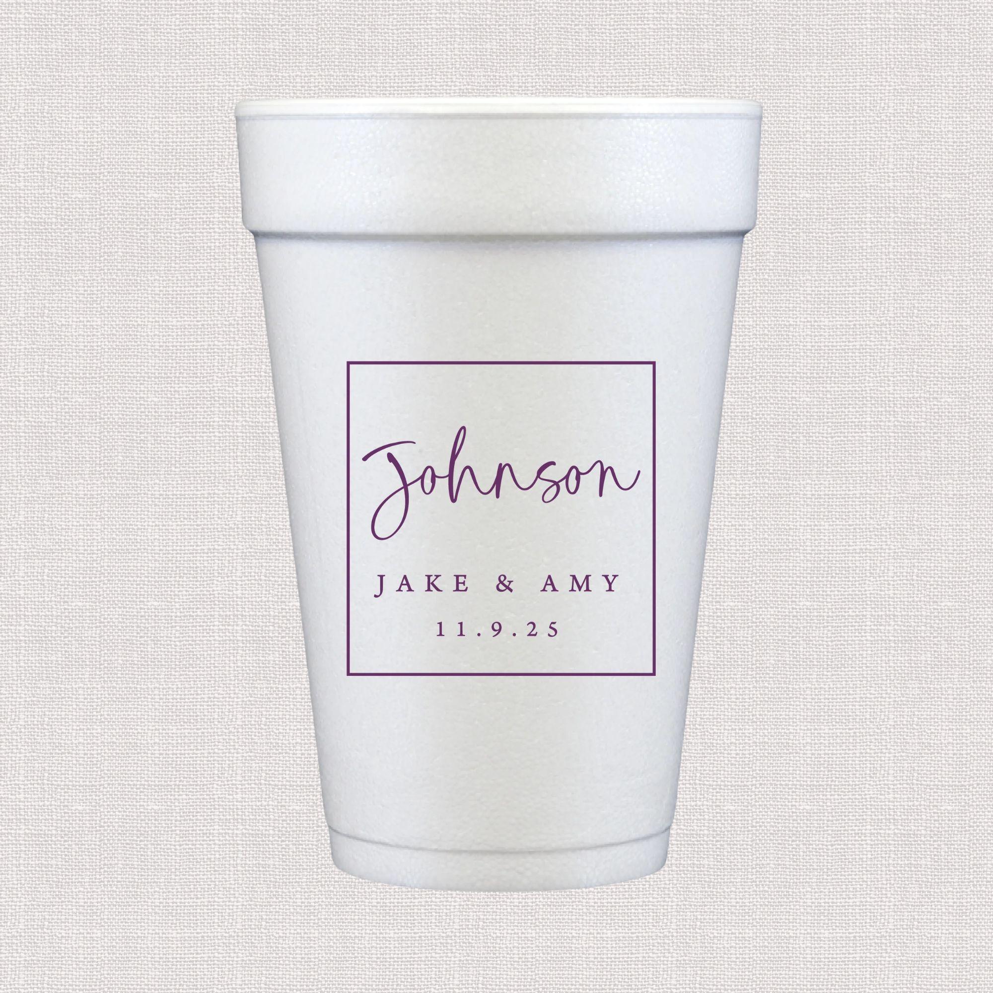 White foam cup with purple script monogram and personalized wedding text in bordered frame design