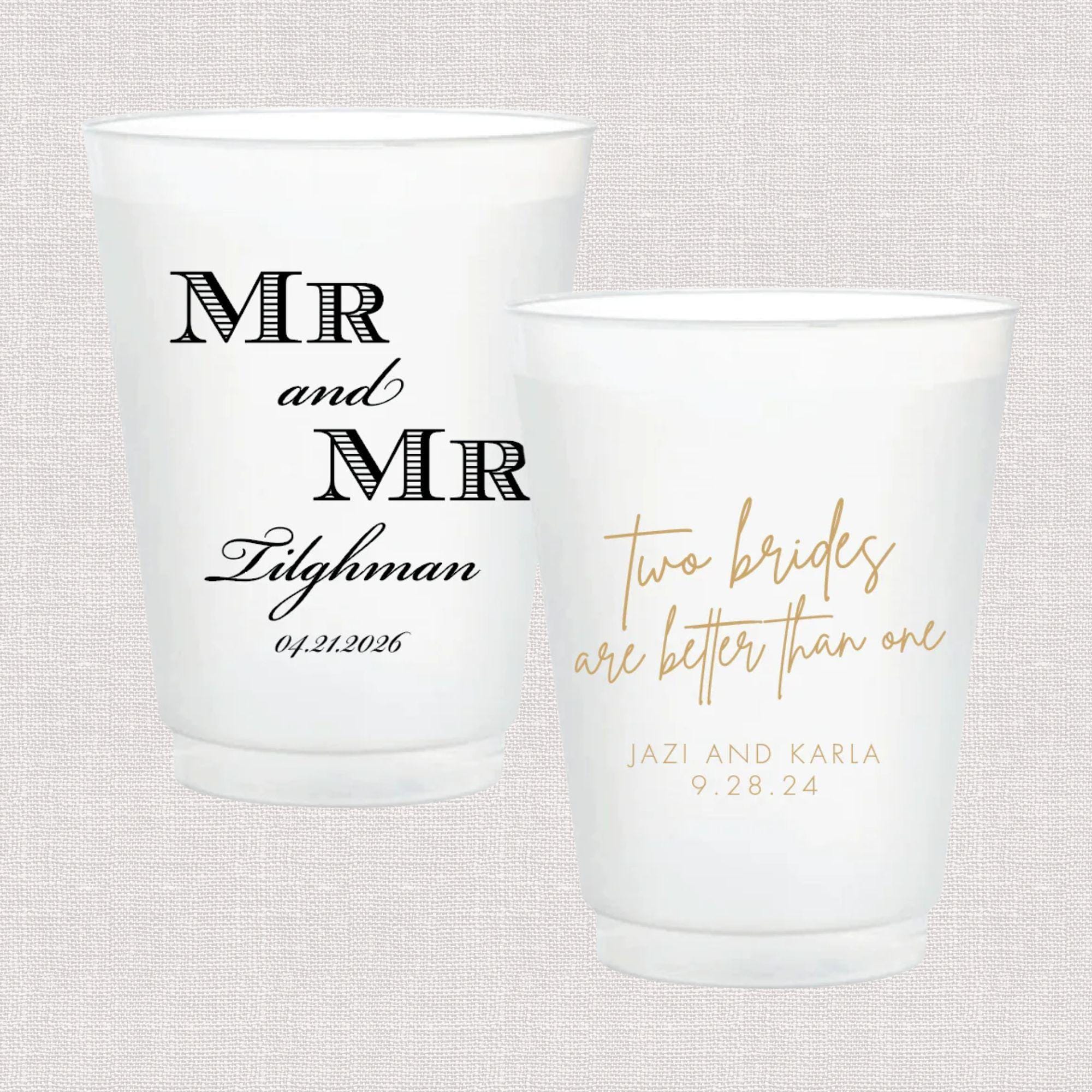 Pair of frosted plastic cups with LGBT wedding designs: one reads "MR and MR Flightman" with date, the other says "two brides are better than one" with names and date.