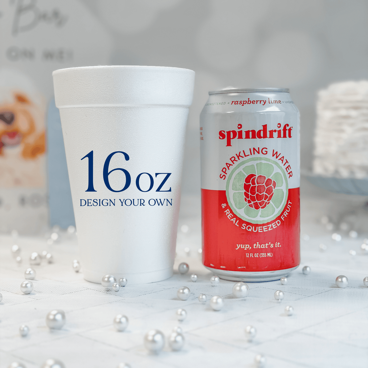 16 oz white foam cup compared to a 12 oz can for size reference, custom navy design