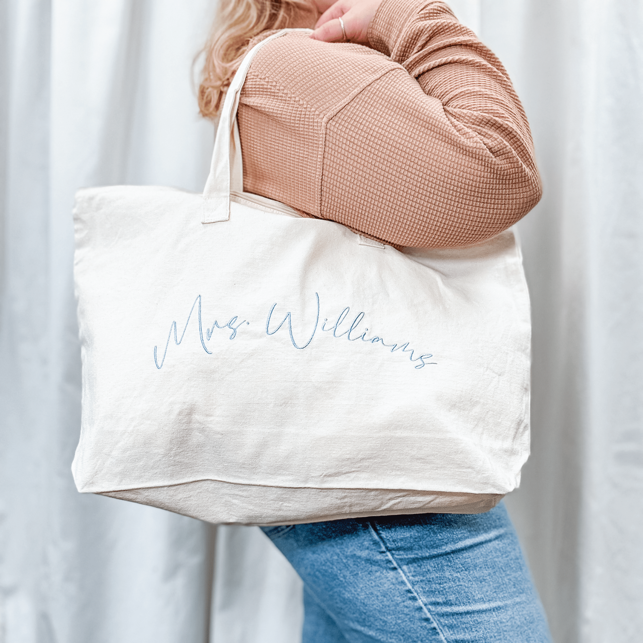 Monogrammed zippered canvas tote for a newlywed