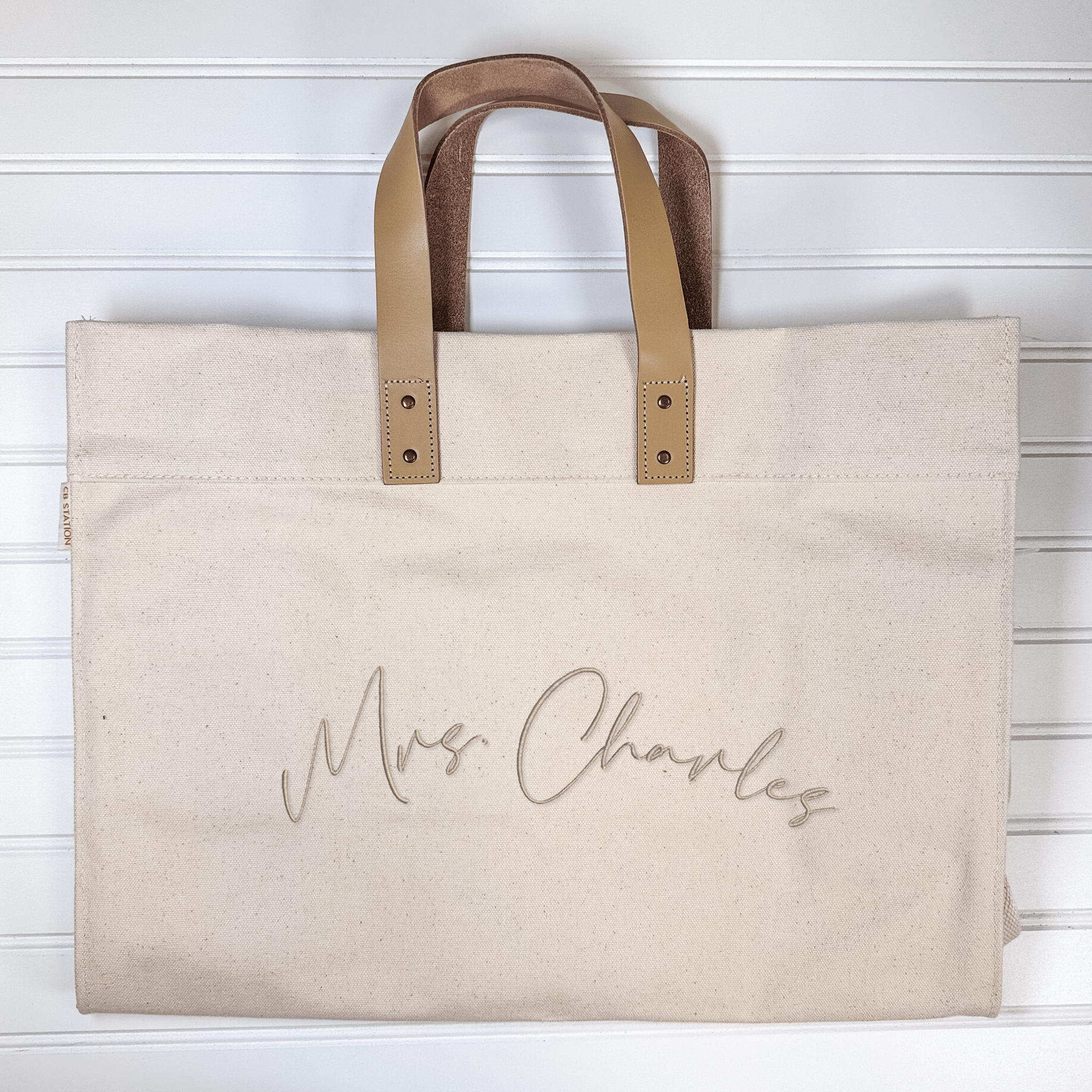 Canvas and leather shoulder tote with personalized name