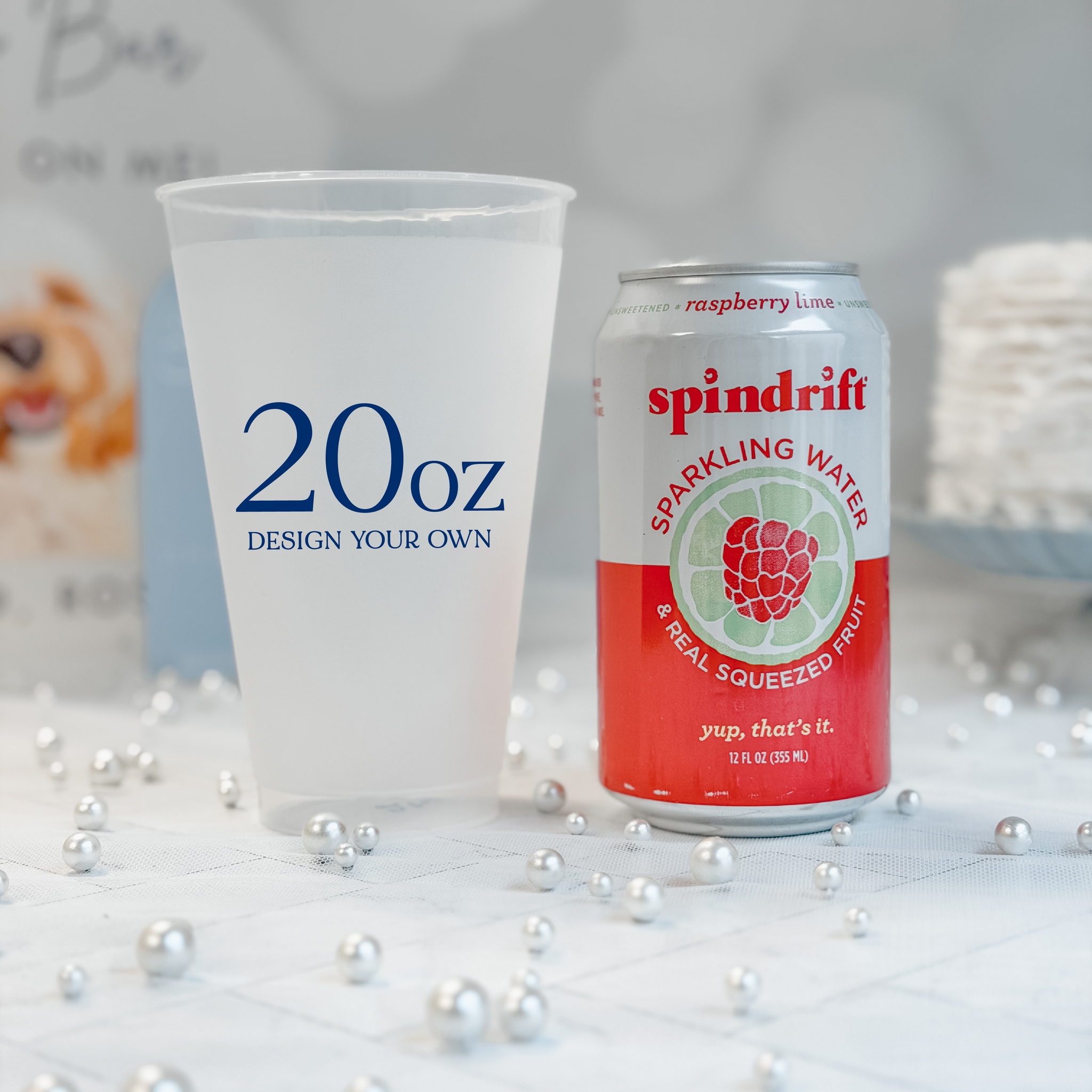 20 oz frosted shatterproof cup next to a 12 oz soda can for scale, personalized navy design
