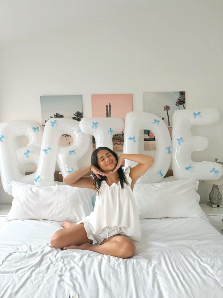 XL Bride and Bows Balloons white balloons with blue bows — styled view