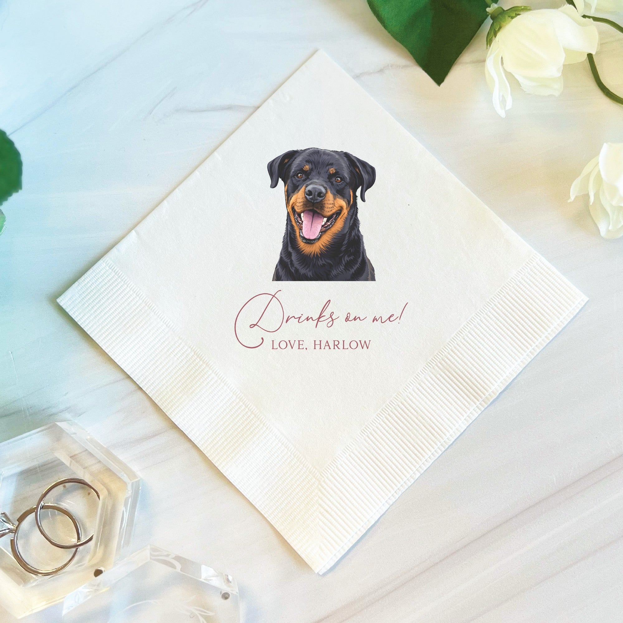A personalized white 3-ply paper wedding napkin features a full-color illustration of a Rottweiler with custom text, ideal for beverage service at an event.