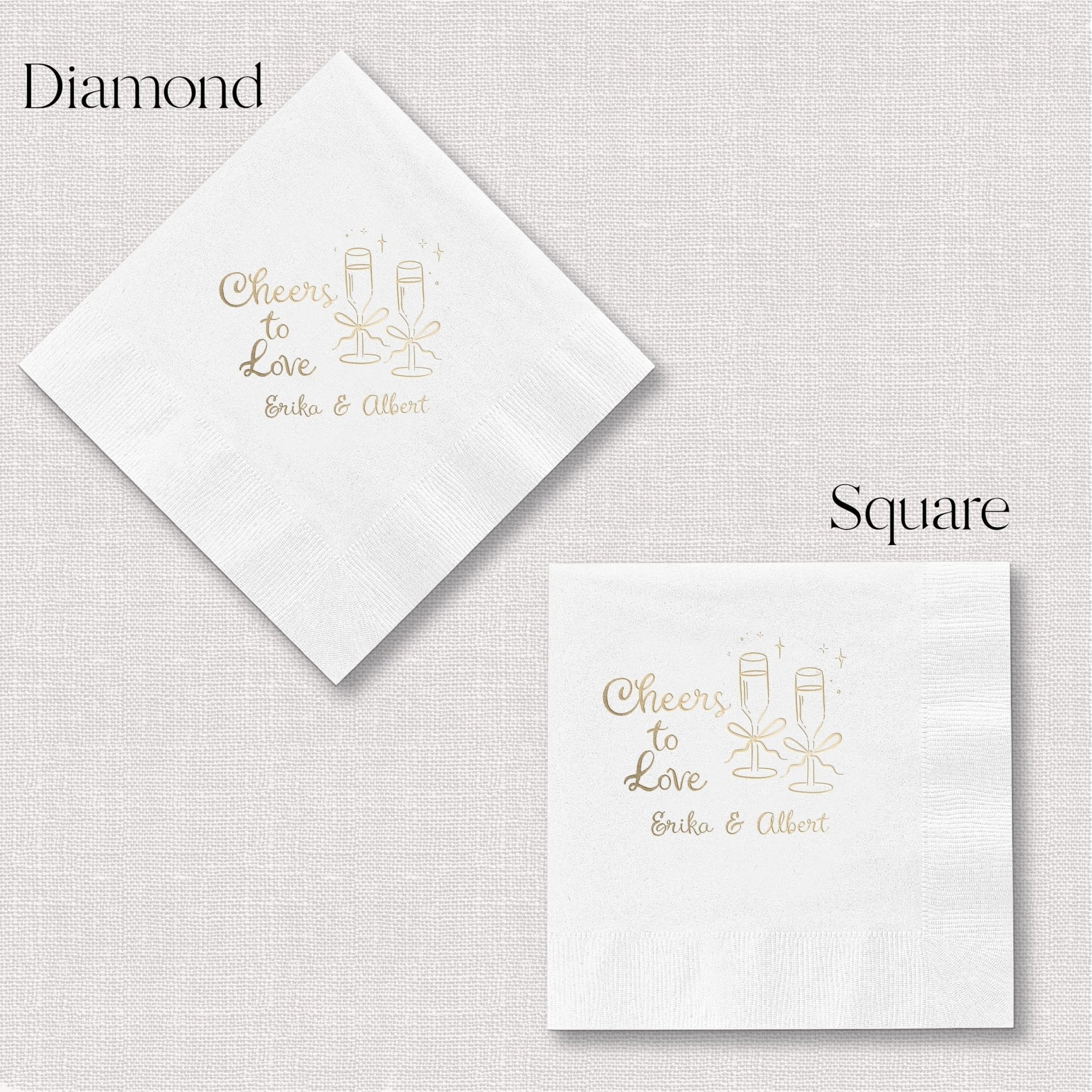 White cocktail napkins with gold foil "Cheers to Love" design and personalized names, shown in diamond and square fold options