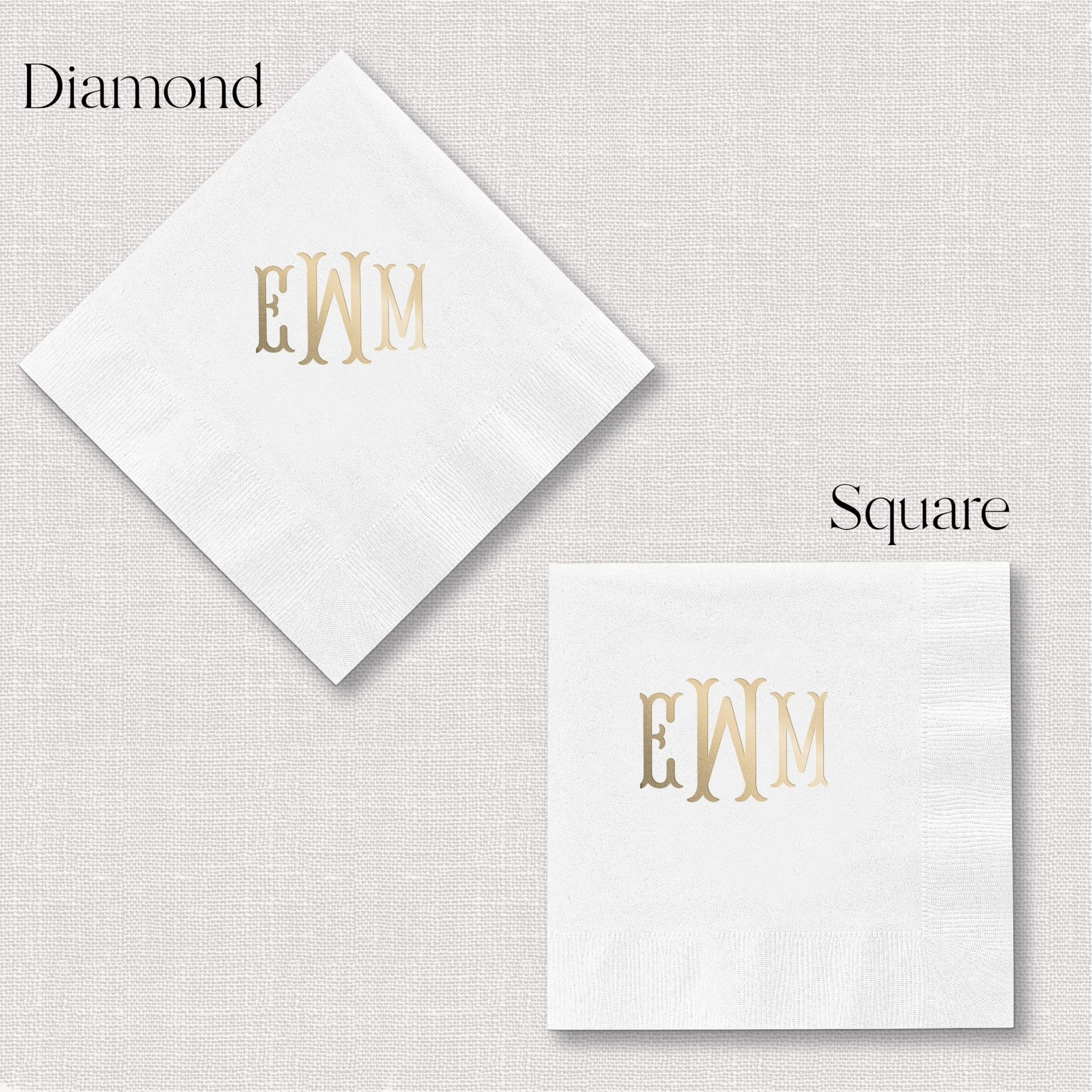 White napkins with gold foil monogram initials EWM in diamond and square shapes