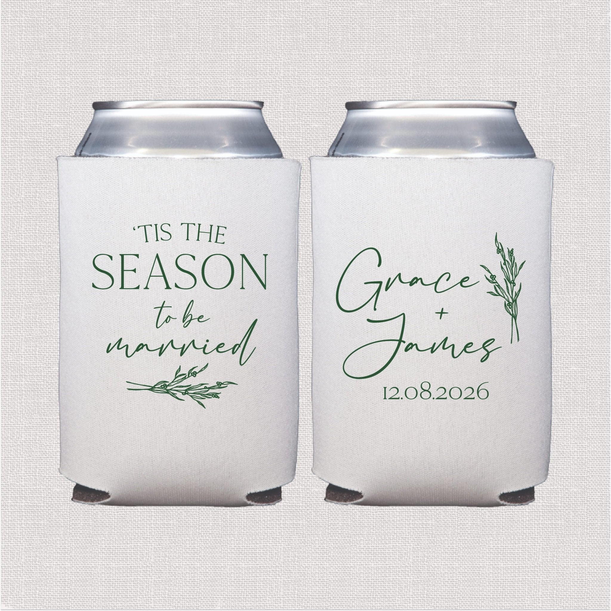 White neoprene can coolers with sage green text reading "Tis The Season to be married" on one side and "Grace + James 12.08.2026" with botanical accent on the other.