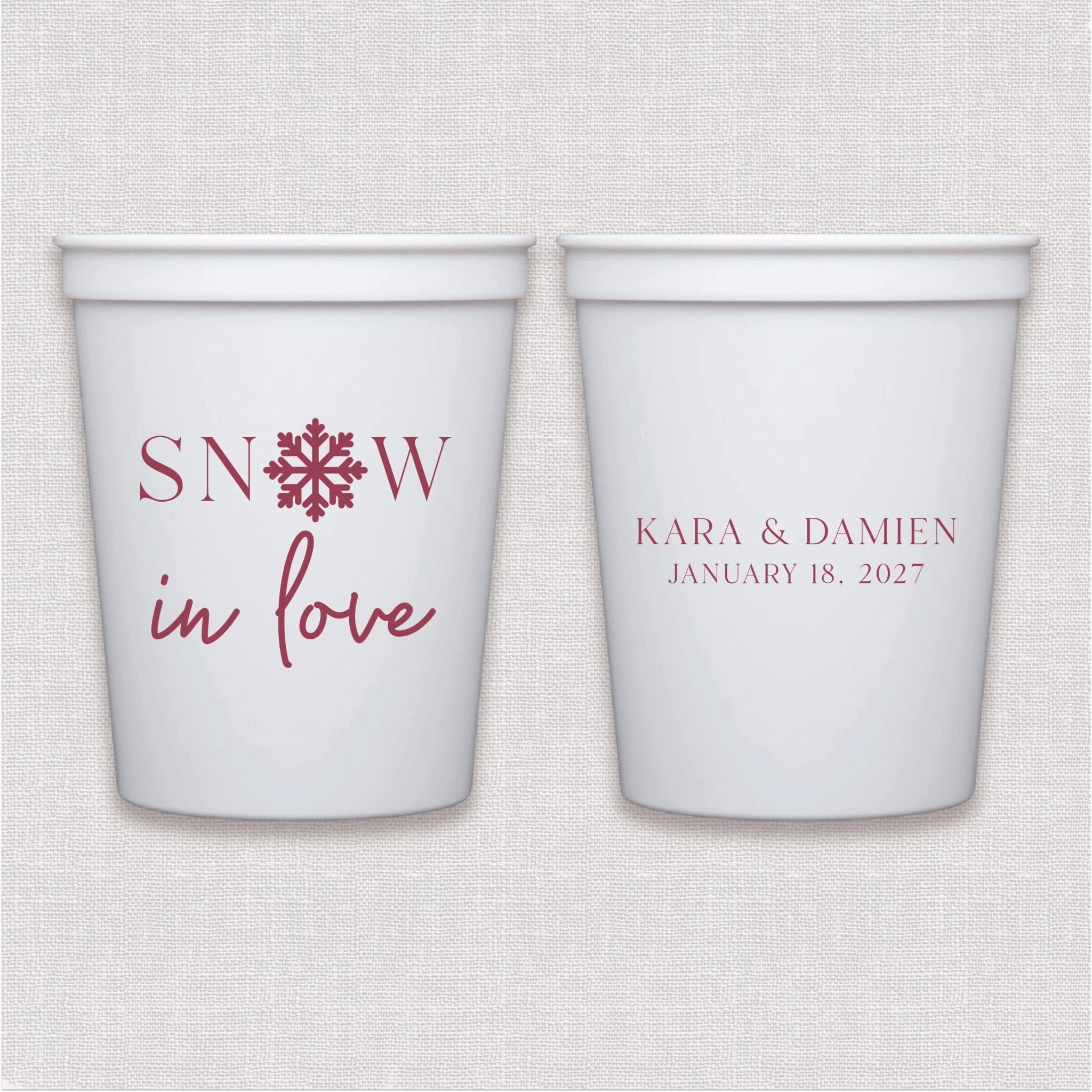 White stadium cup with personalized text text, red snowflake design, and personalized couple names with wedding date