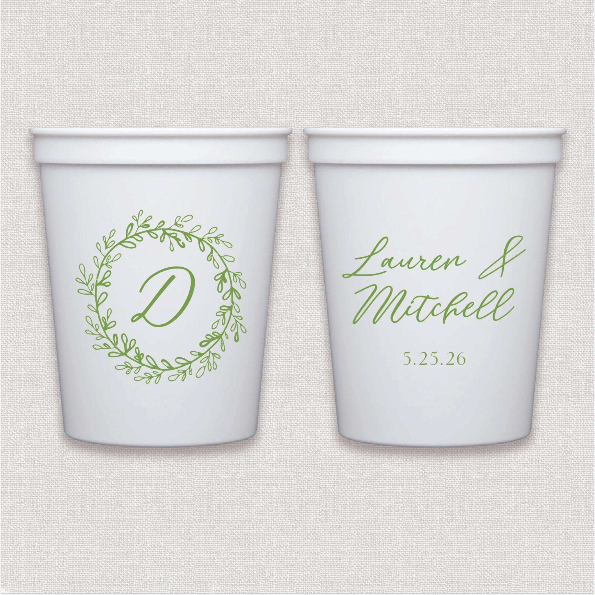 White stadium cup with sage green floral wreath monogram and personalized wedding text design
