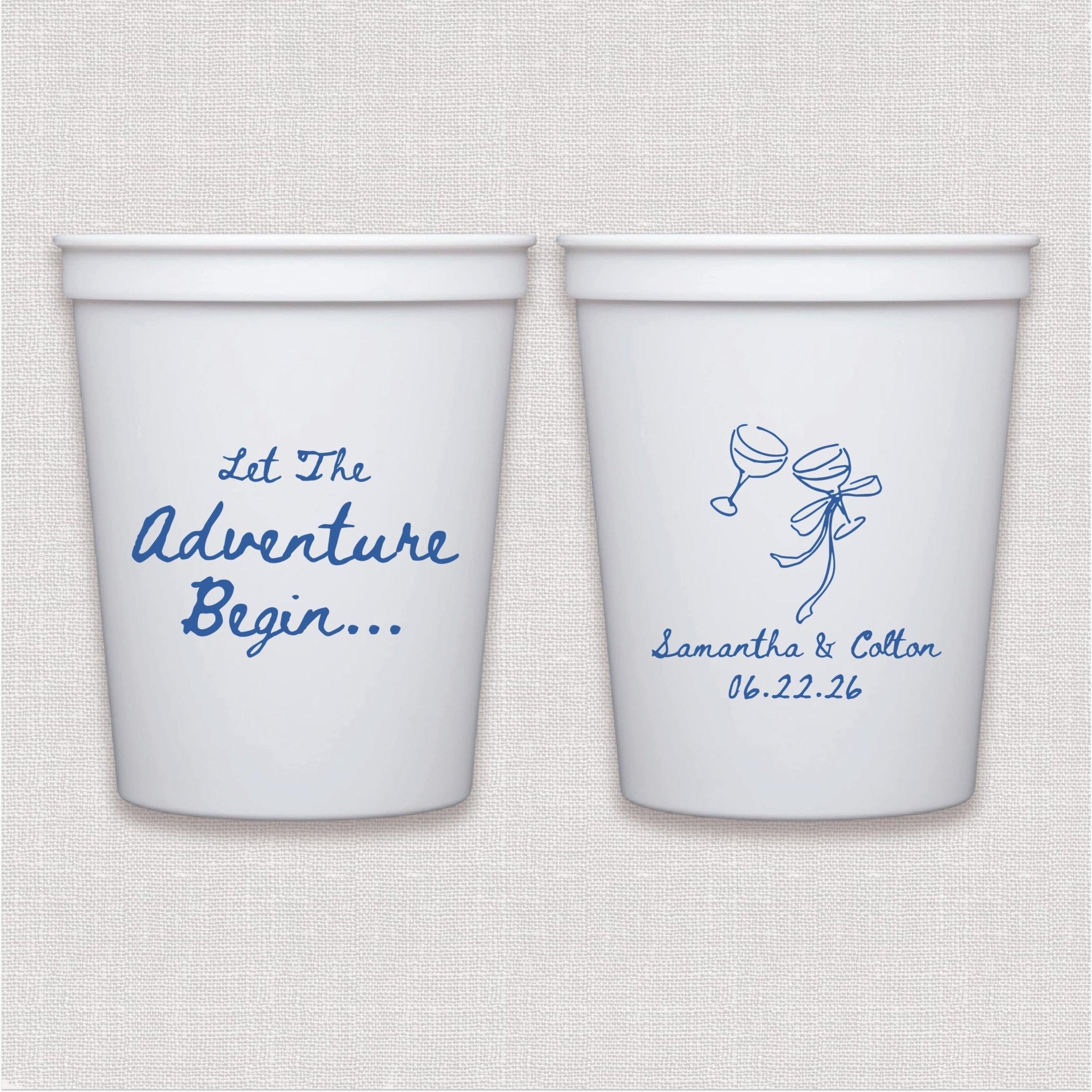 White stadium cup with blue script wedding text and bow design