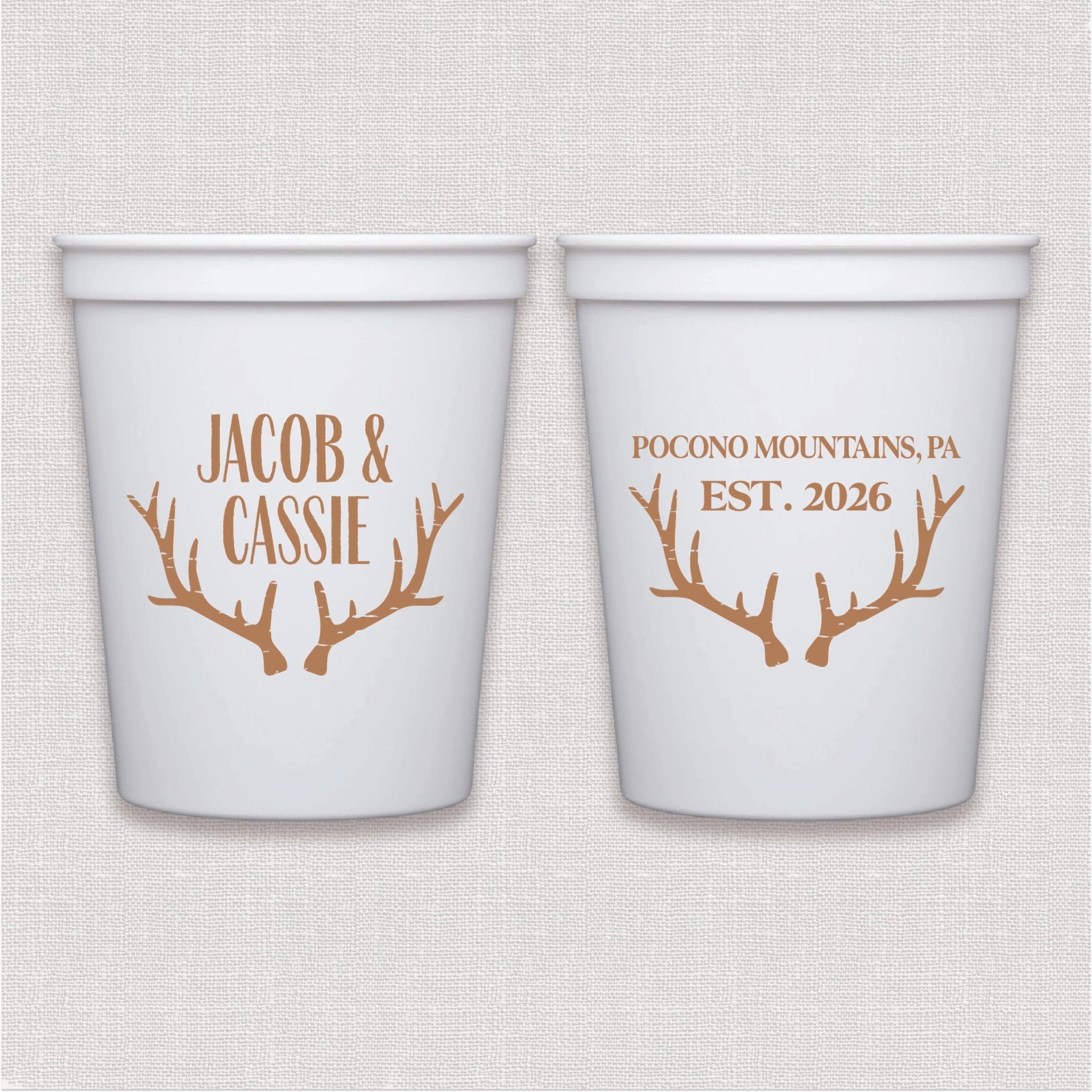 White stadium cups with copper antler design and personalized wedding text