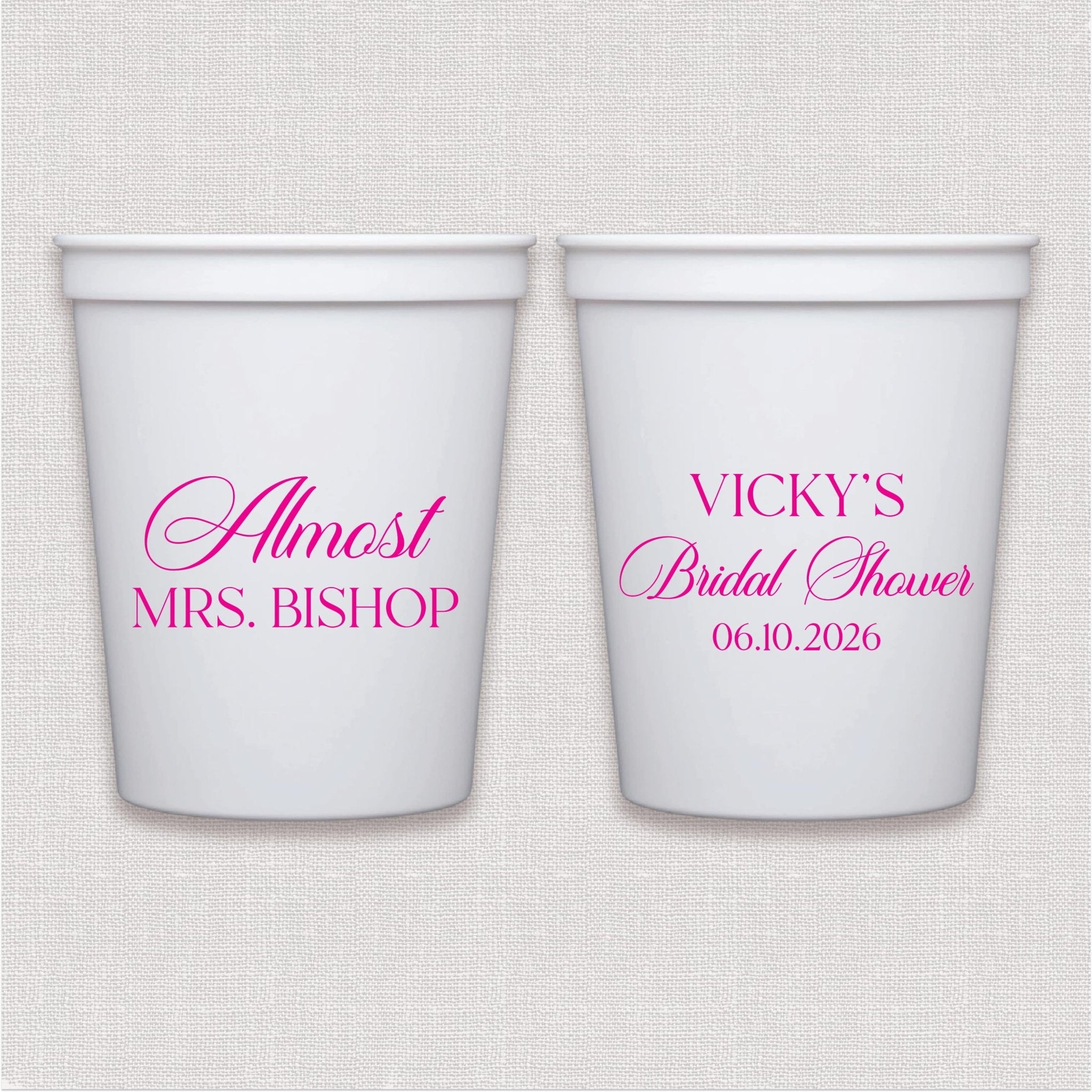 White stadium cups with hot pink bridal shower text and personalized wedding date design