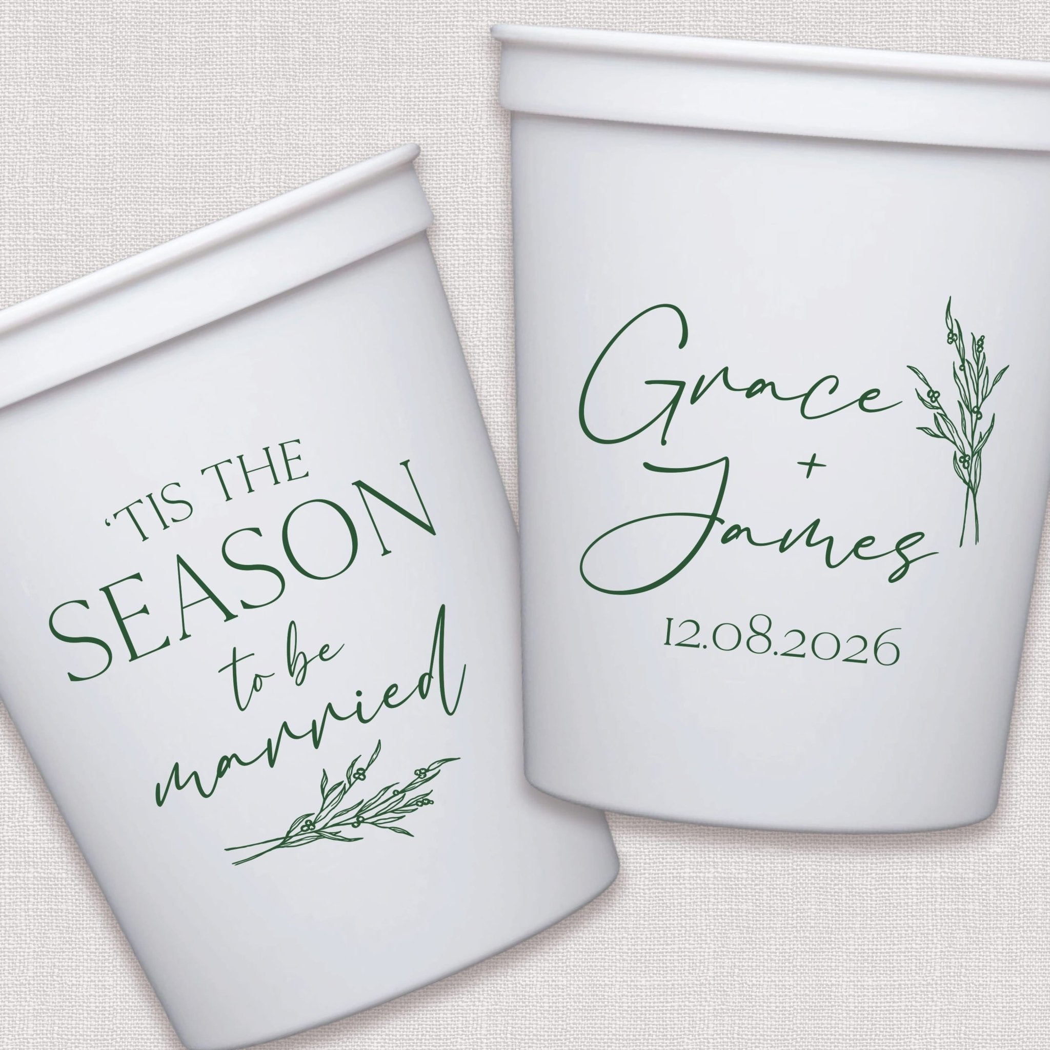 White stadium cups with sage green script text and botanical leaf designs