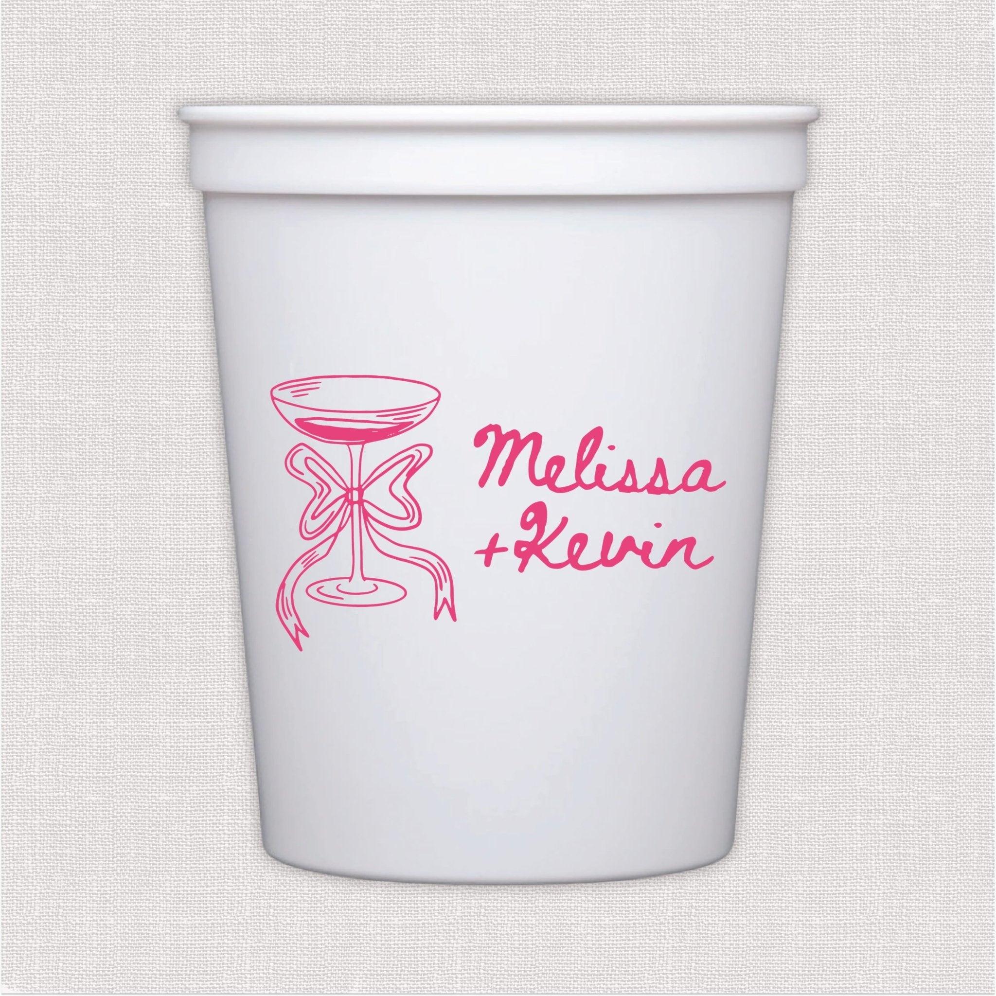 White stadium cup with pink champagne glass and script wedding text design