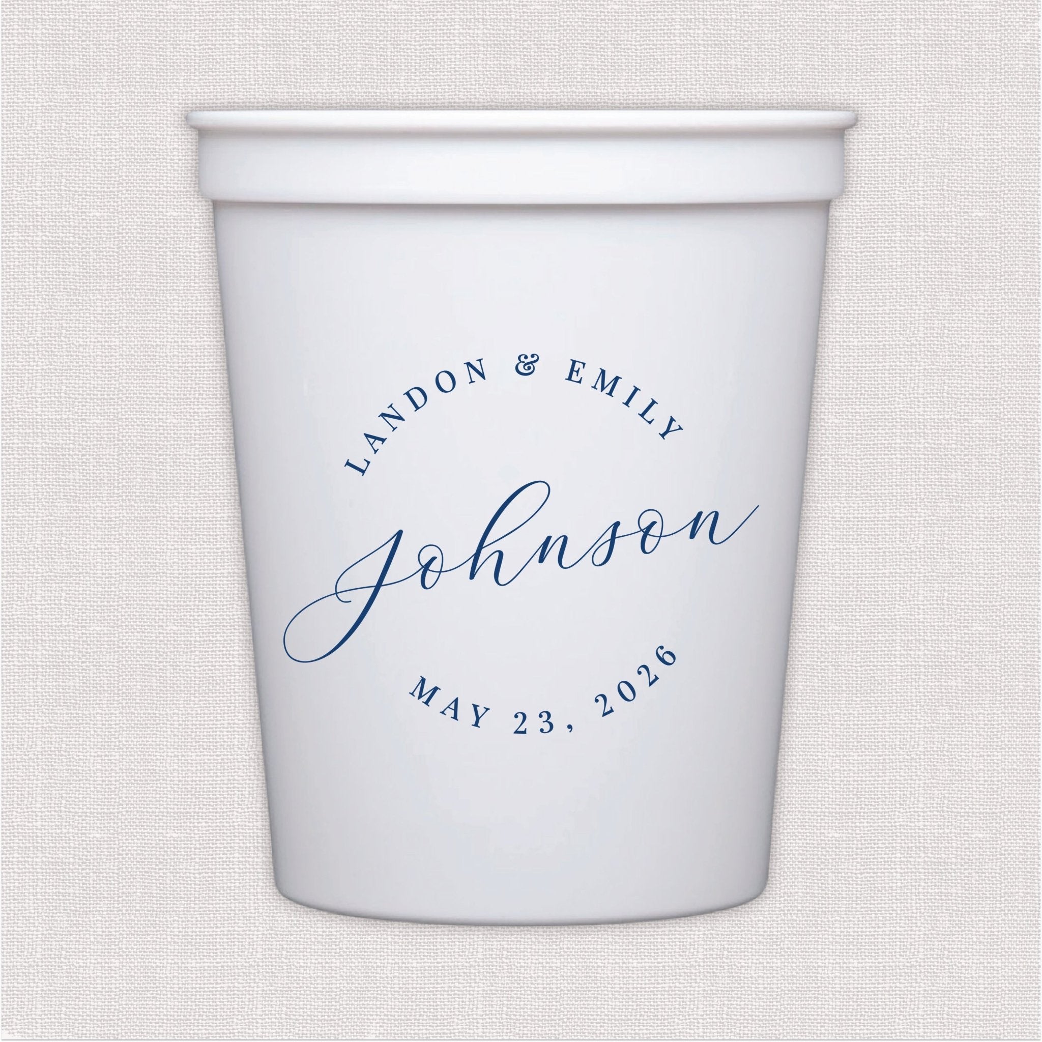 White stadium cup with blue script personalized wedding text and date