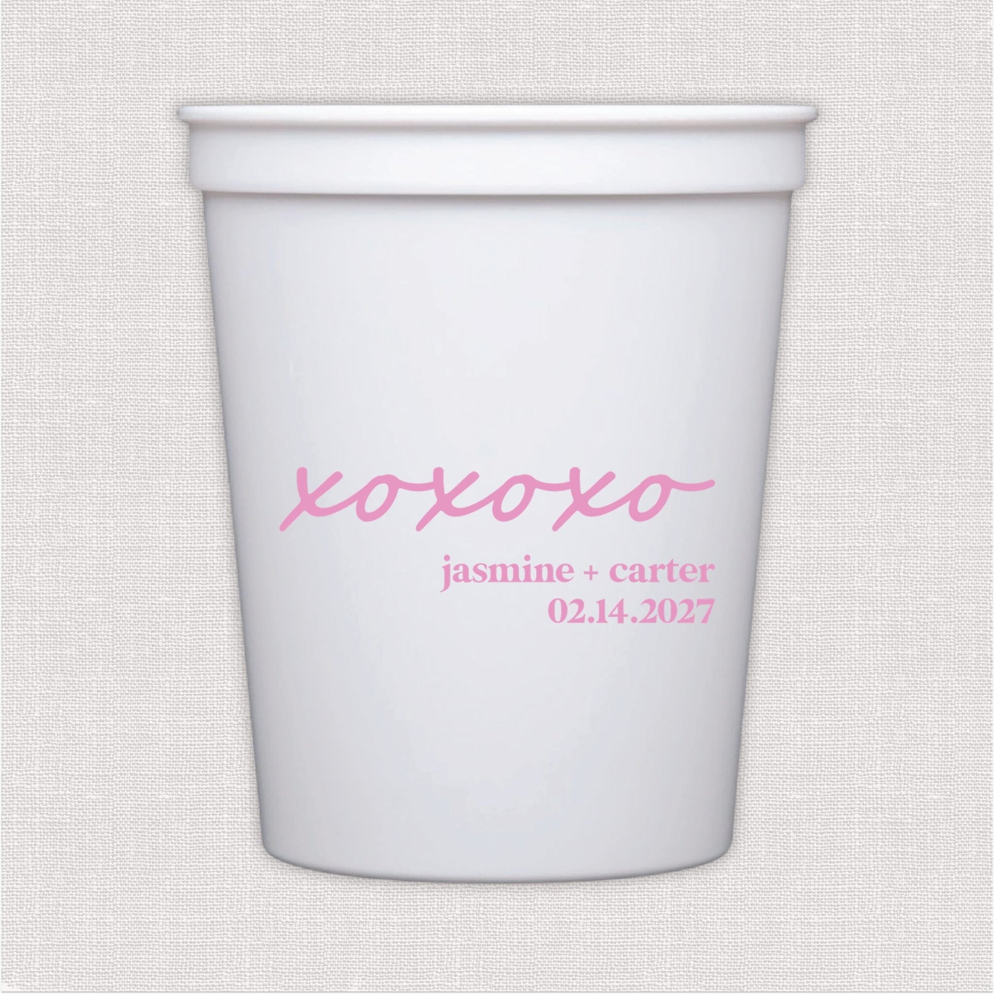White stadium cup with pink xoxo script and personalized wedding text design