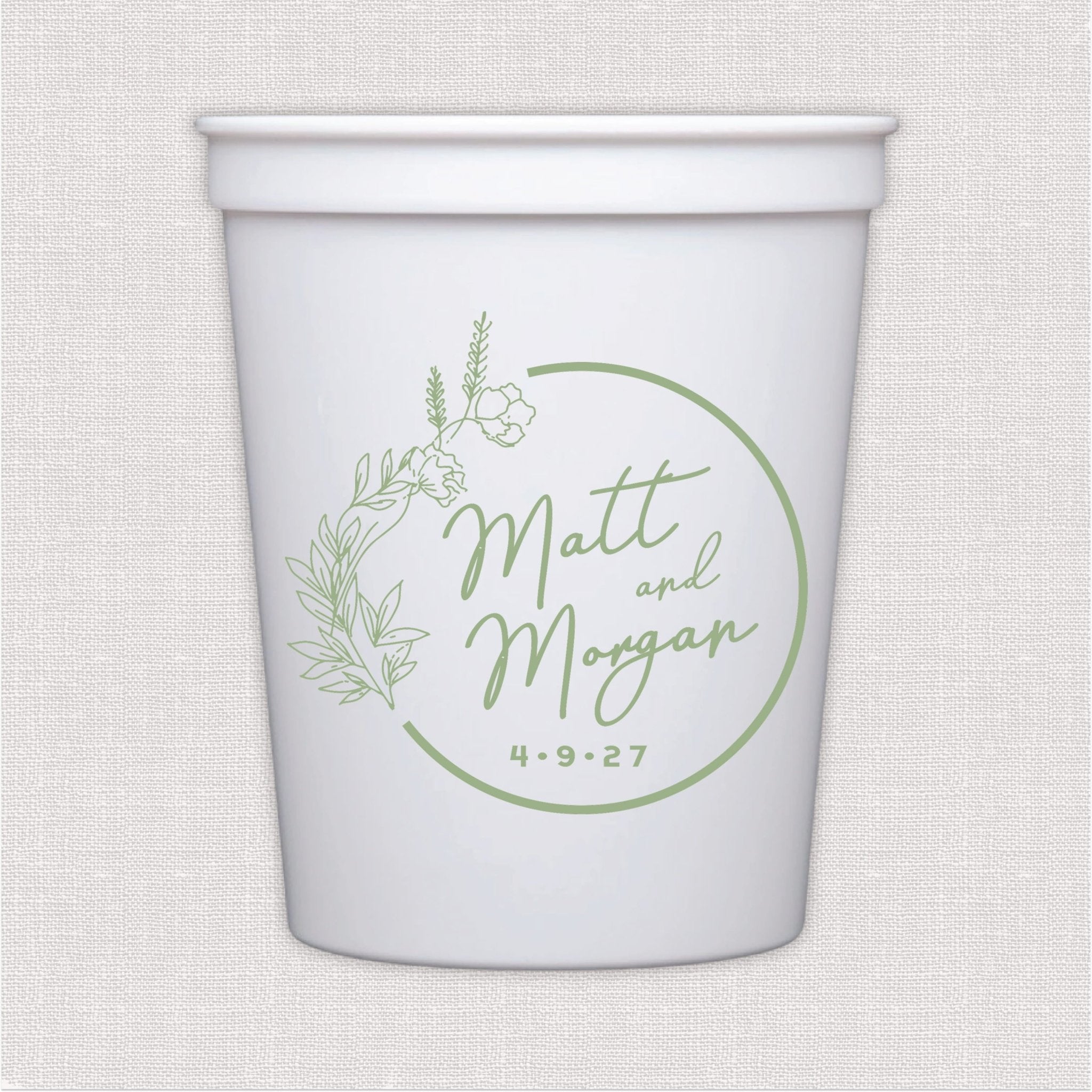 White stadium cup with sage green botanical wreath and personalized wedding text design