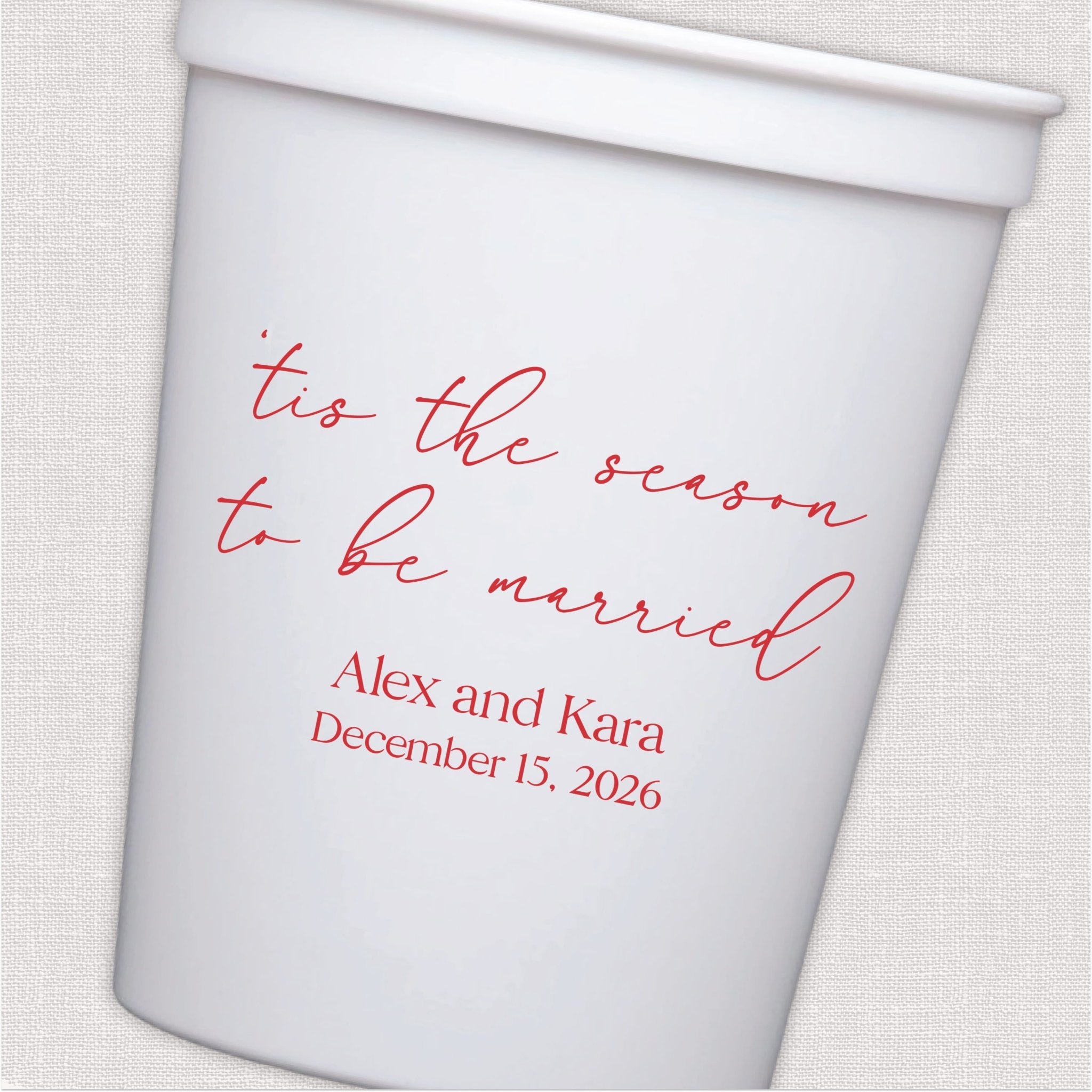 White stadium cup with coral script wedding text and personalized couple names and date design