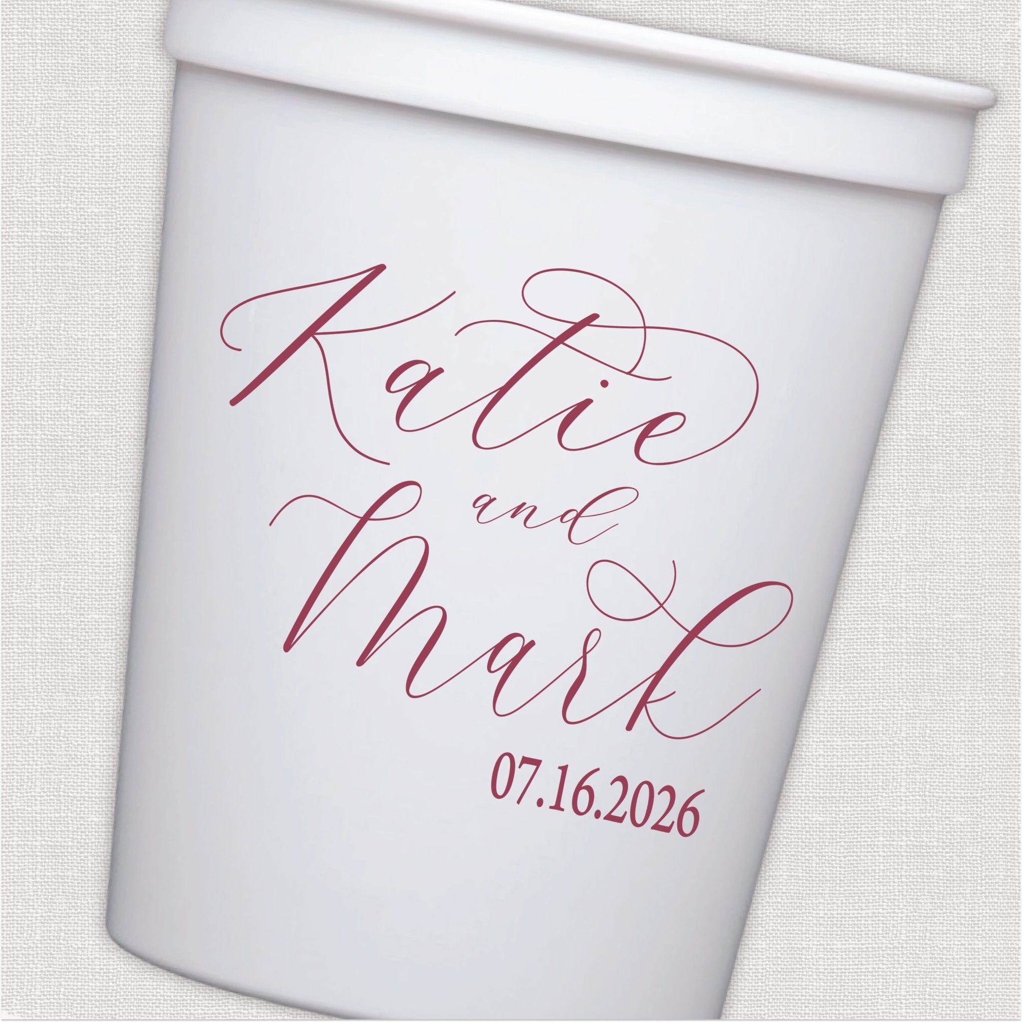 White stadium cup with burgundy script couple names and wedding date design