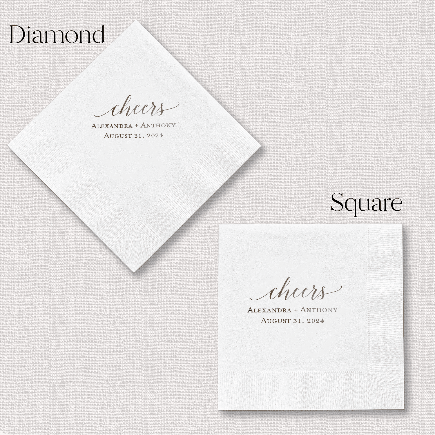 White foil stamped napkins in diamond and square shapes with "cheers" script and personalized names and wedding date.