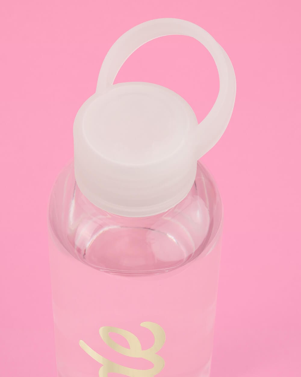 Clear water bottle with white lid and handle featuring yellow bride design on pink background