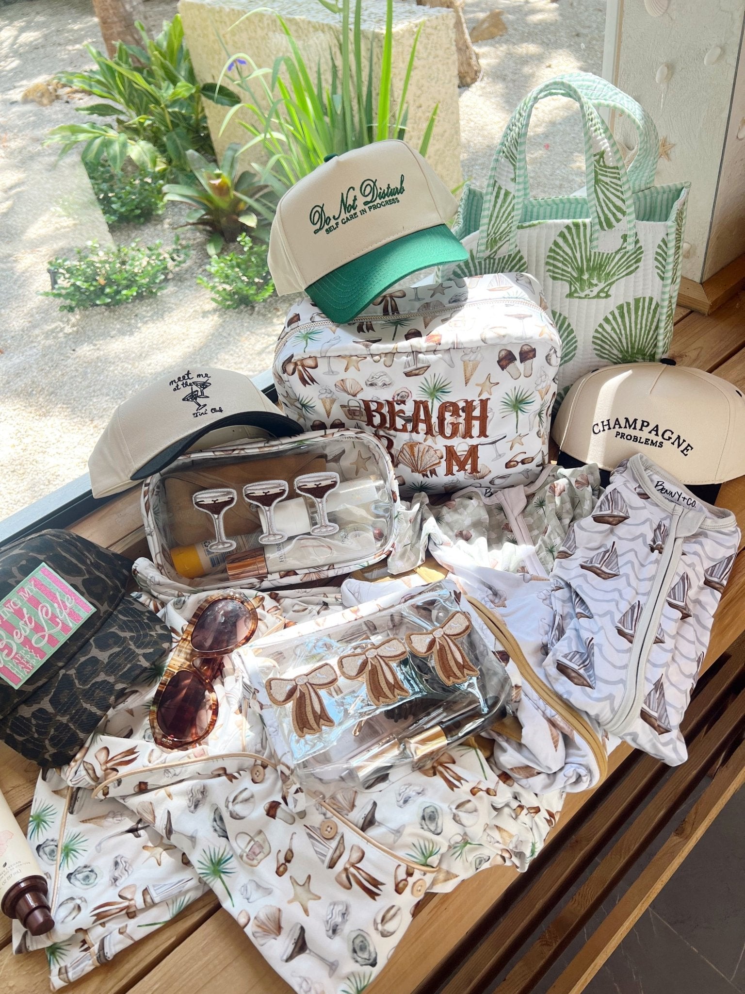 Clear large travel bag with neutral coastal cocktail design featuring espresso martini motifs and shell illustrations
