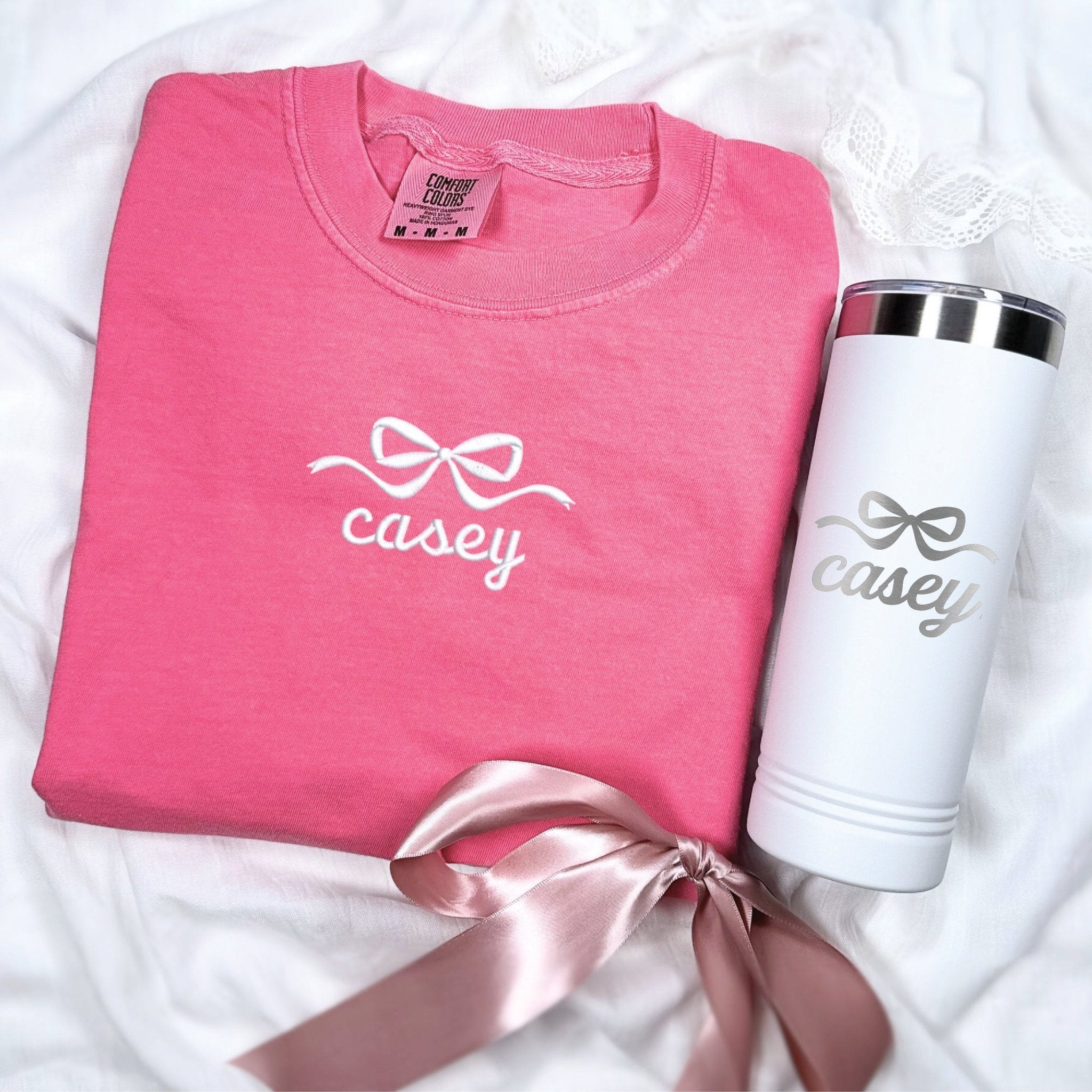 Hot pink comfort colors tee and white tumbler with bow and personalized script text design