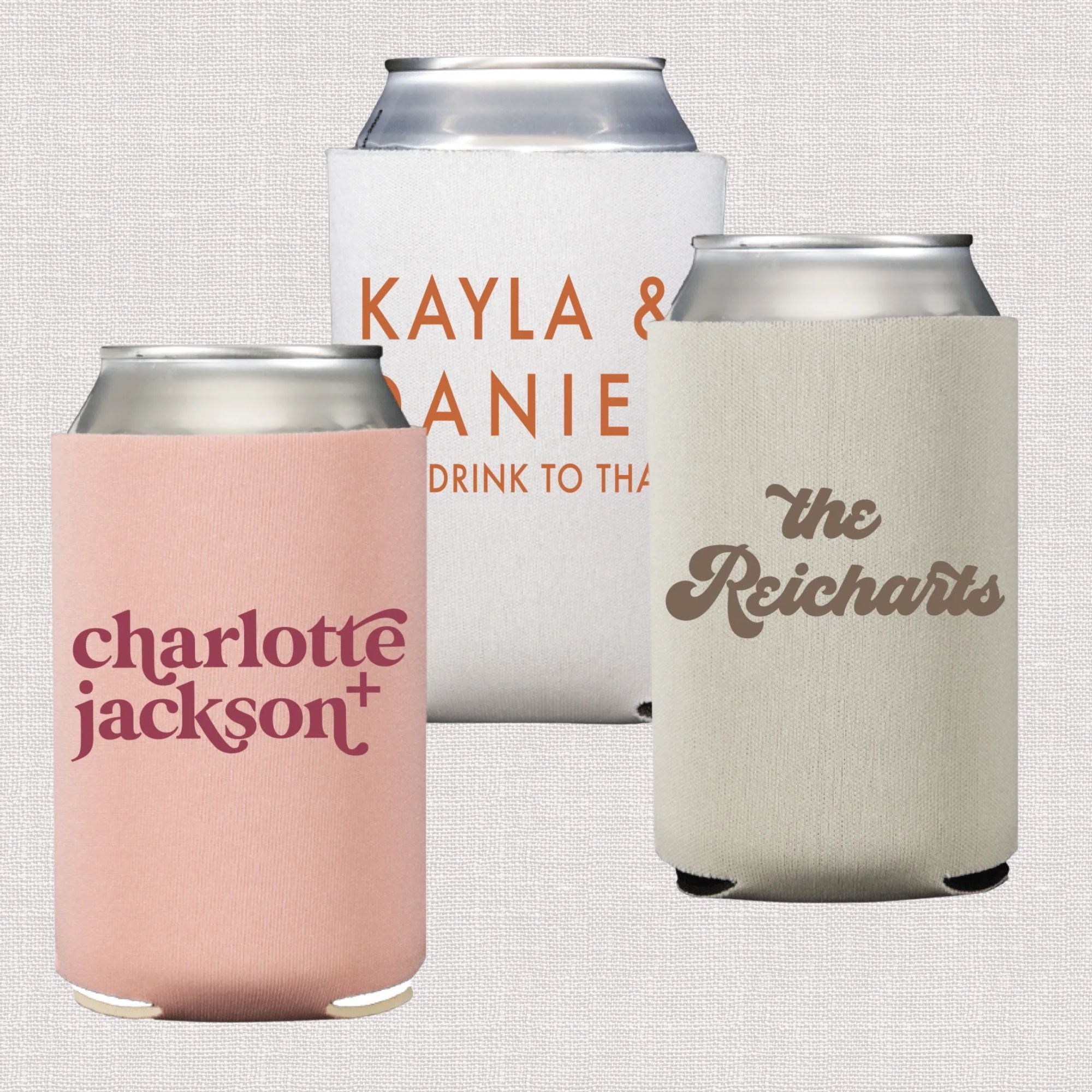 Pink can cooler with personalized name in script text, white can cooler with couple names and wedding toast text, cream ca...