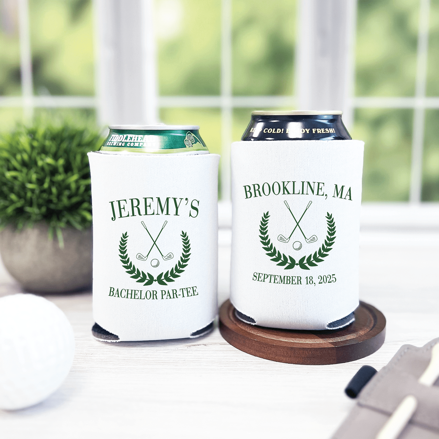 White neoprene can coolers with golf club and laurel wreath design, personalized with "Jeremy's Bachelor Par-Tee" and "Brookline, MA September 18, 2025"