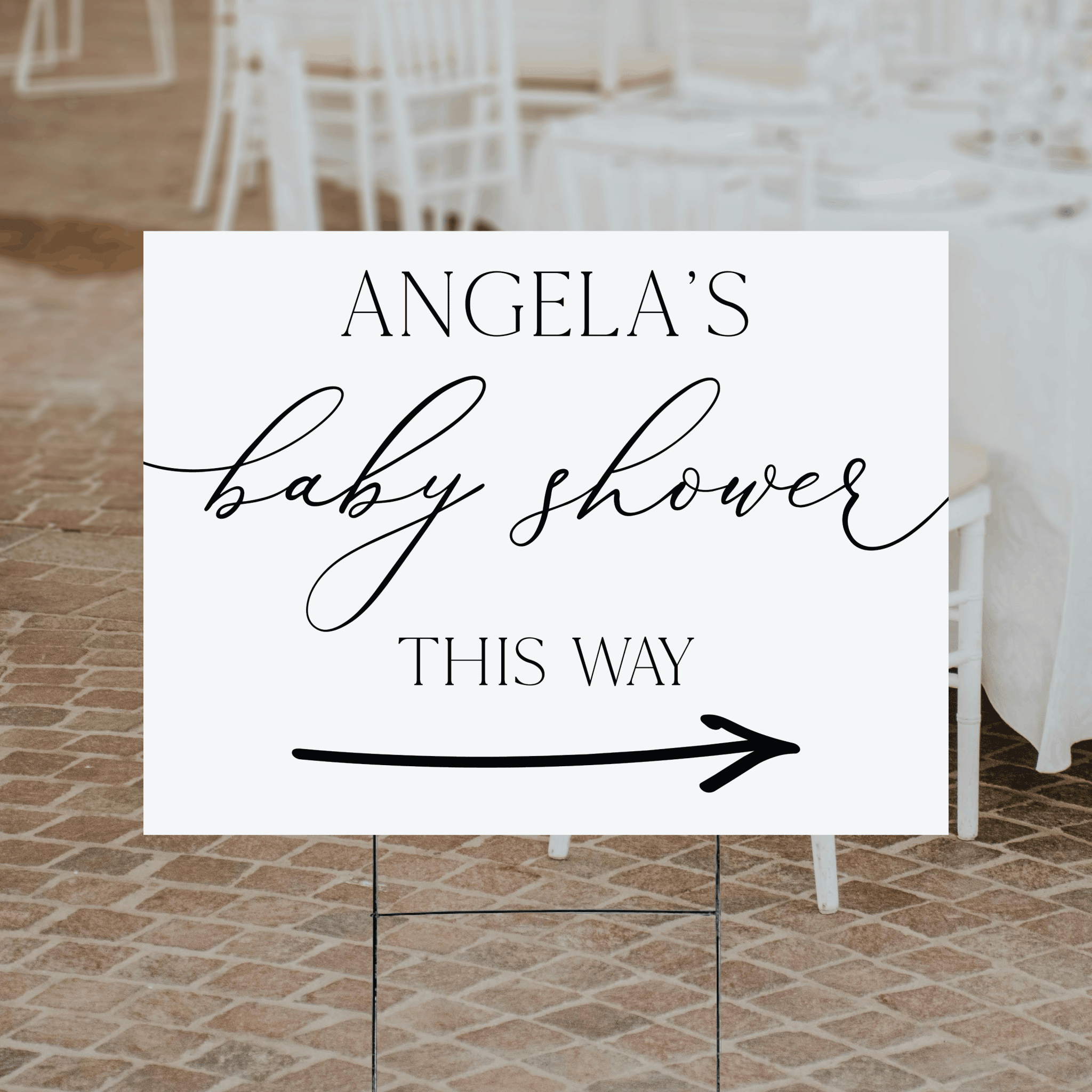 A personalized baby shower directional yard sign with custom name and arrow, printed in UV ink on durable corrugated plastic, displayed outdoors.