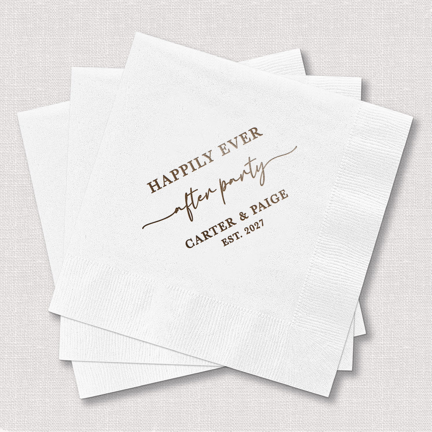 A product photo of a personalized cocktail napkin from the Happily Ever After Wedding Bundle, featuring a whimsical sentiment design on soft 3-ply paper stock.