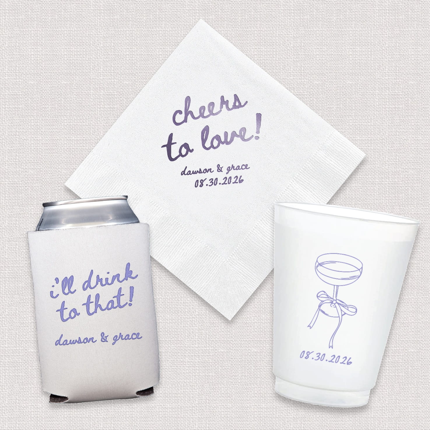 A complete Cheers to Love wedding bundle featuring personalized cocktail napkins, frosted shatterproof cups, and neoprene can coolers, arranged together as a coordinated set for the wedding celebration.
