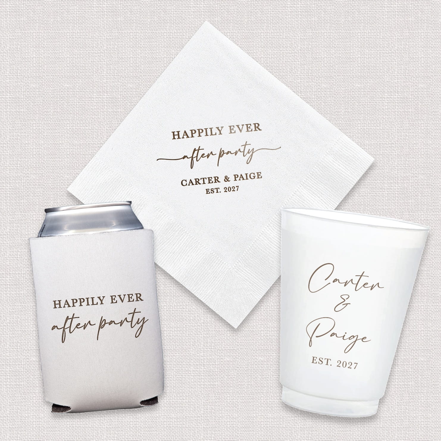 A complete Happily Ever After wedding bundle featuring personalized cocktail napkins, frosted shatterproof cups, and neoprene can coolers, arranged together as a coordinated set for the wedding celebration.