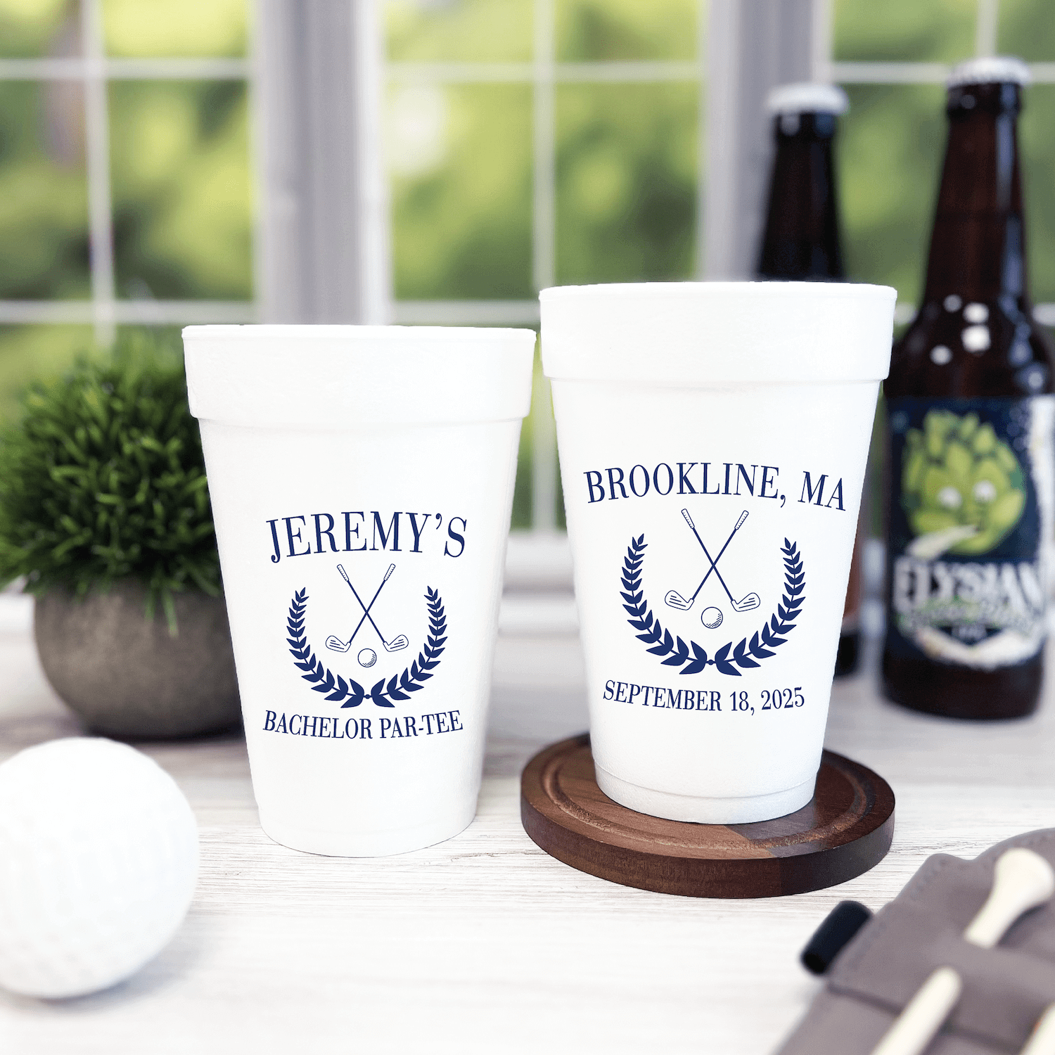 White foam cups with navy golf and laurel wreath design, personalized with "Jeremy's Bachelor Par-Tee" and "Brookline, MA September 16, 2025"