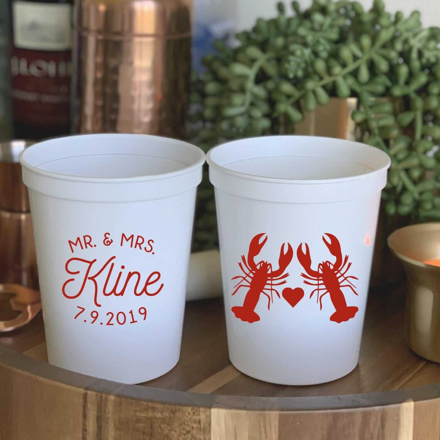 White stadium cups with red lobster design and "Mr. & Mrs Kline 7.9.2019" personalization on opposite sides
