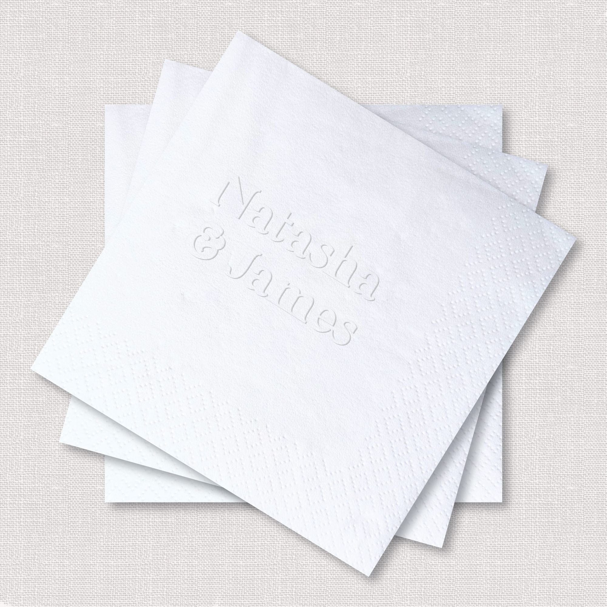 Custom Embossed Napkin Bold Serif Couples Names White Square Fold Angled Stack View – Rubi and Lib