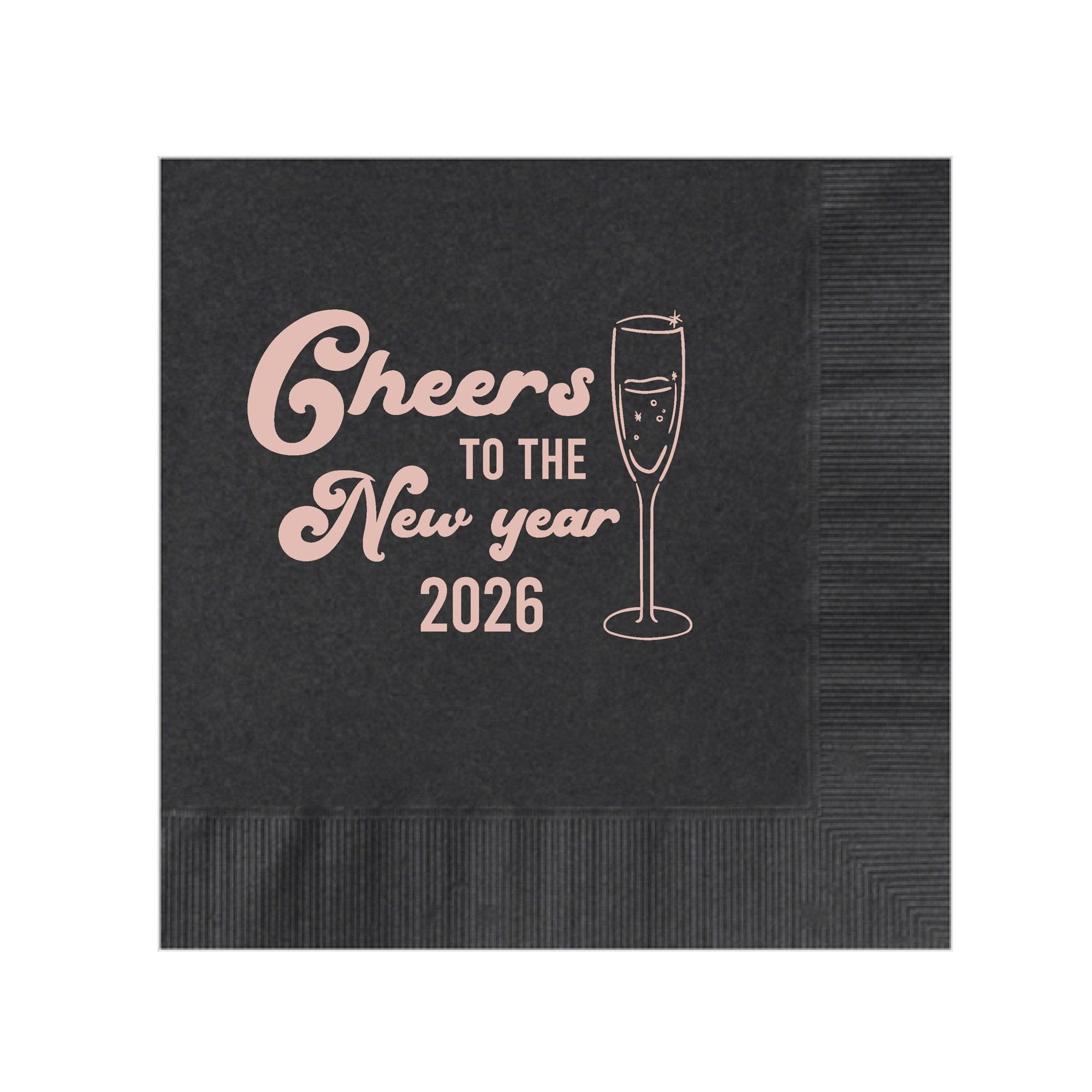A black paper cocktail napkin features a rose gold foil design with decorative text and a champagne glass illustration, ideal for a New Year's celebration.