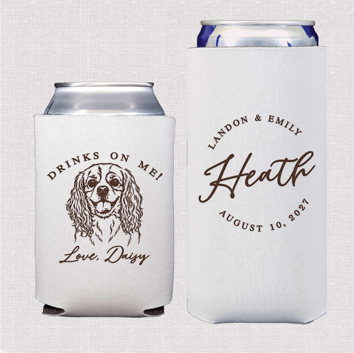 A set of two personalized white fabric can coolers for a wedding or event, one featuring a custom pet illustration with a playful phrase and the other displaying a personalized family name and date in an elegant script font.