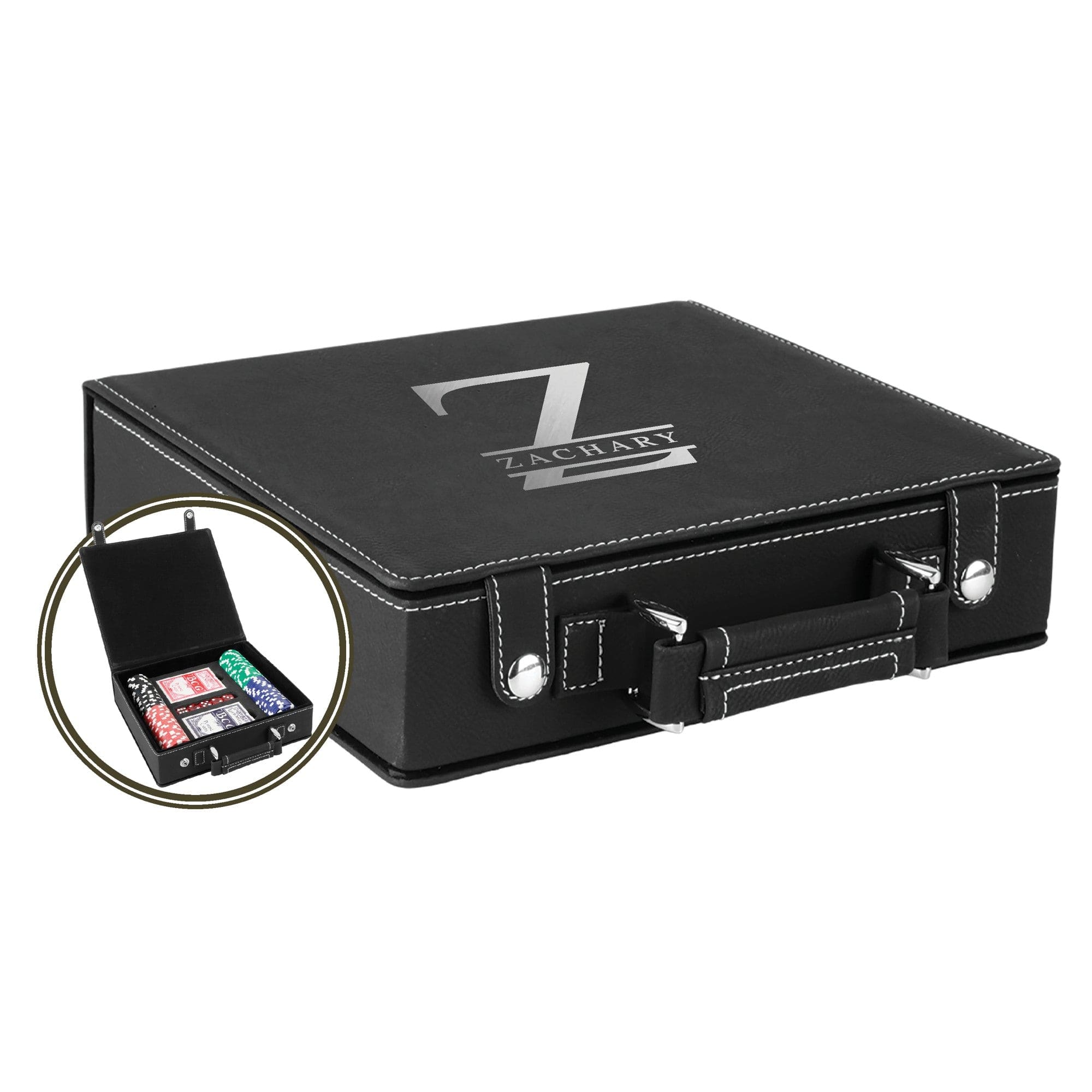 A black leatherette poker set case with white accent stitching and chrome hardware, featuring an interior filled with playing cards, multi-colored poker chips, and dice, serving as an elegant gift for game enthusiasts.