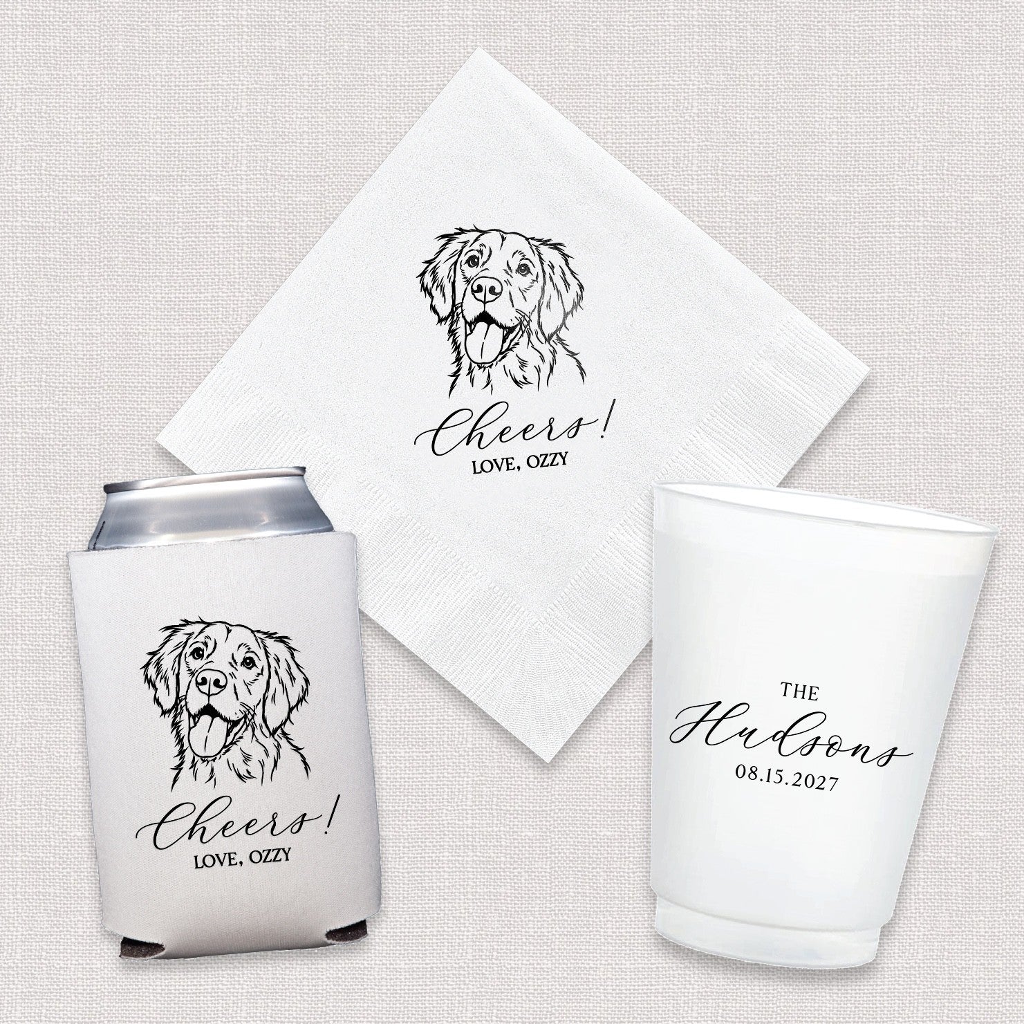 A personalized wedding and event decor bundle featuring a white koozie, a white paper napkin, and a white frosted plastic cup, all with black custom designs including a dog portrait and elegant text.
