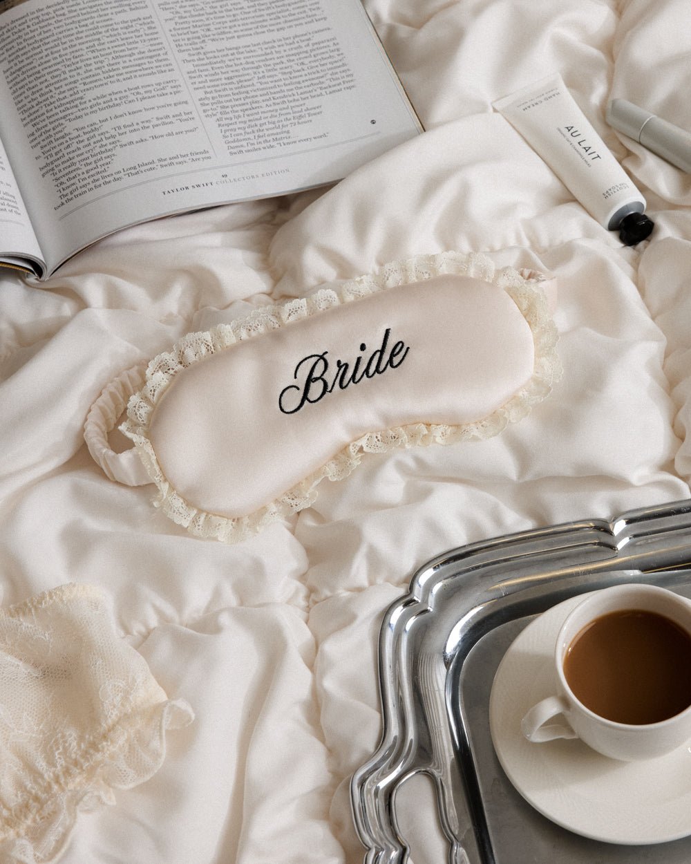 Embroidered satin Bride sleep mask — styled view