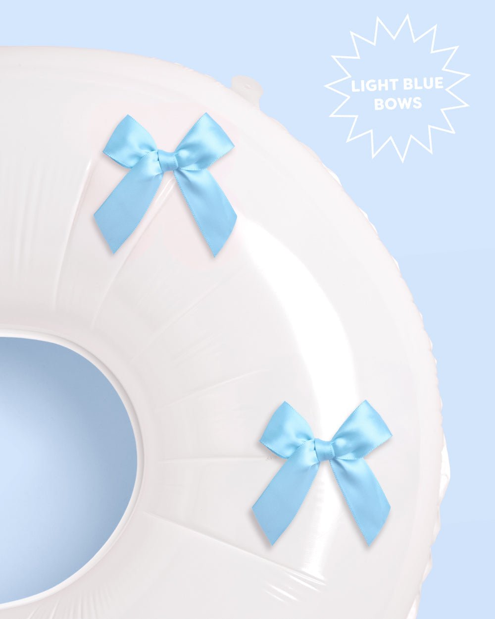 XL Bride and Bows Balloons white balloons with blue bows — close-up