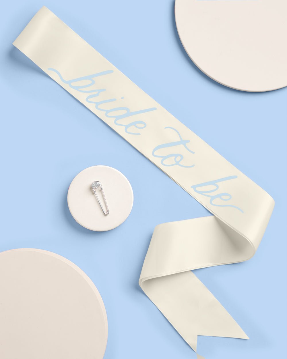 Coastal Bride ivory and blue sash — close-up