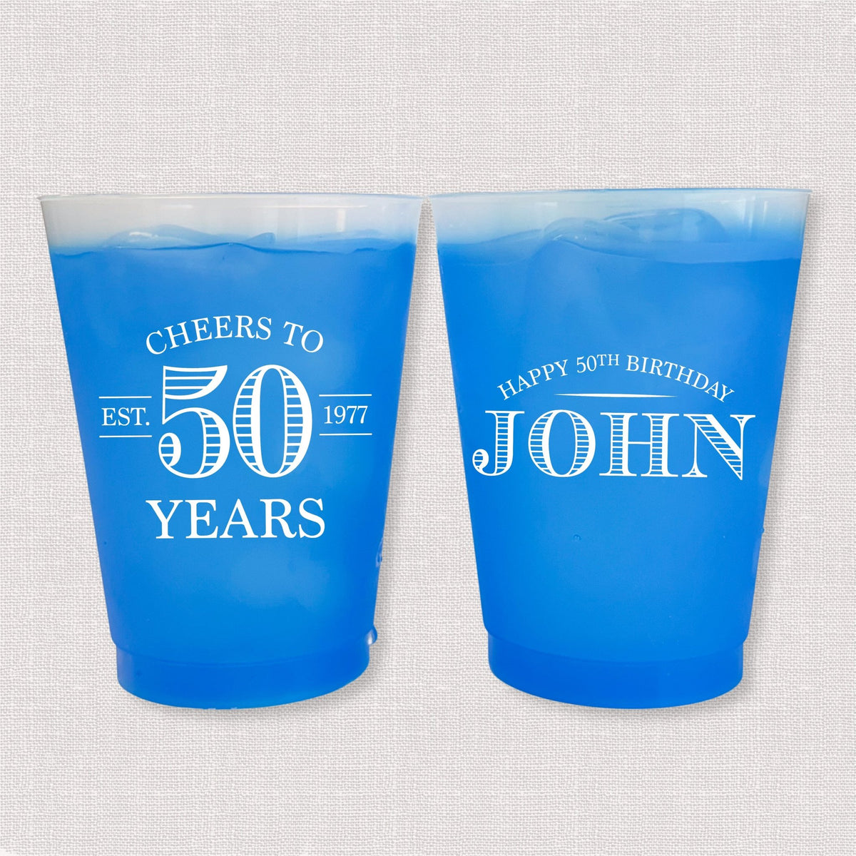 Blue color changing frosted birthday cups with vintage Cheers to 50 Years design and Happy 50th Birthday name
