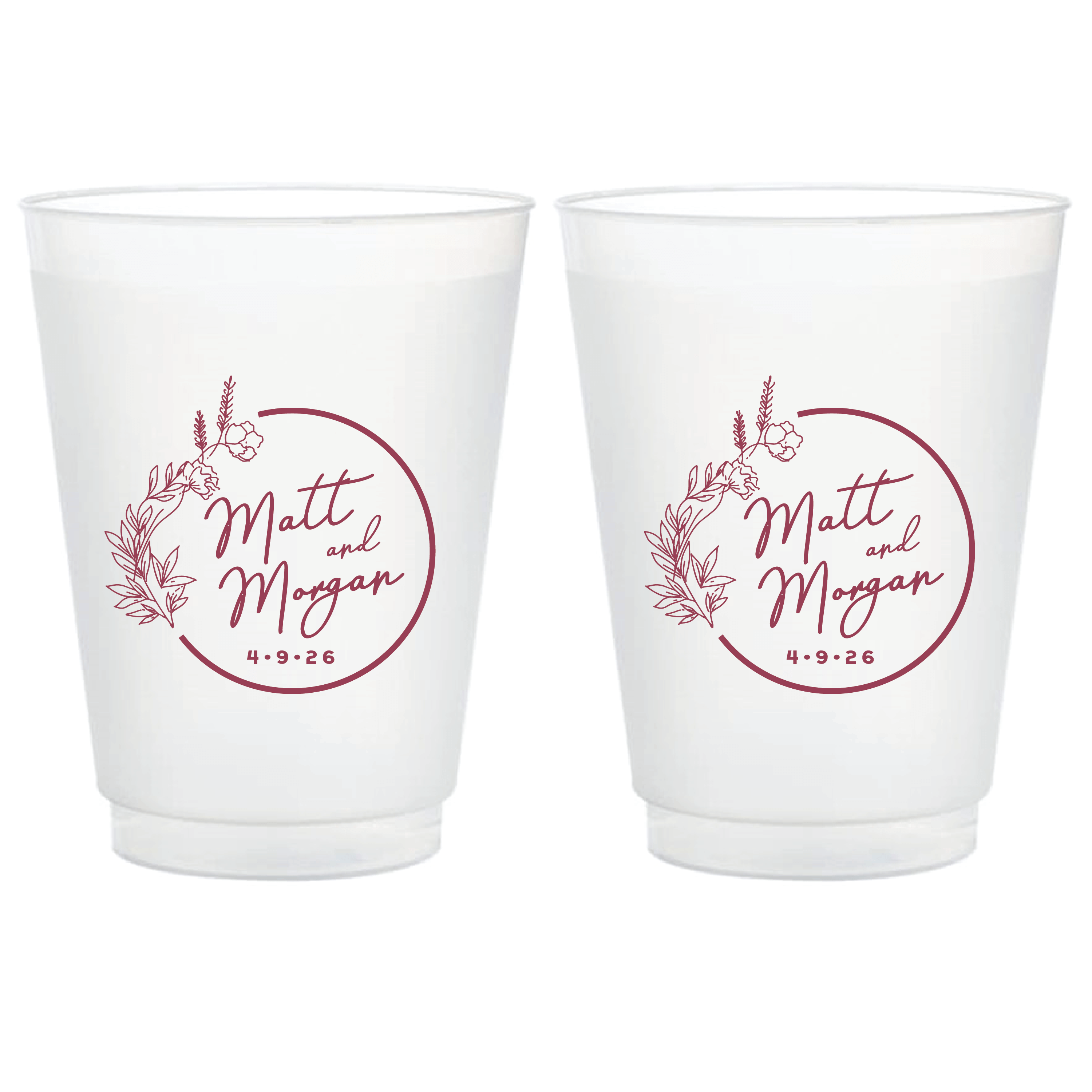 Two frosted cups with burgundy floral wreath design and personalized names Matt and Morgan with wedding date
