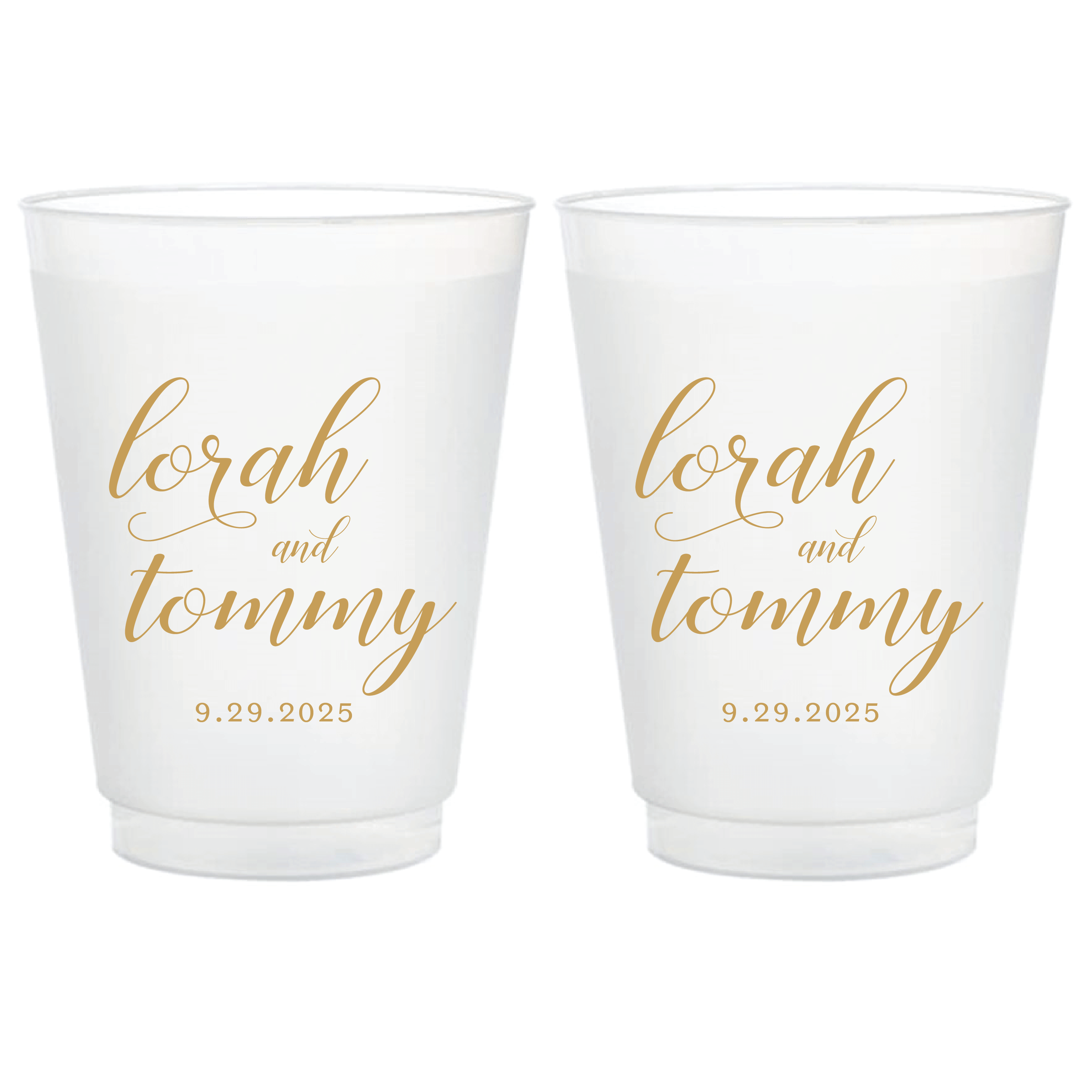 Two frosted white cups personalized with "lorah and tommy" in gold script and wedding date 9.29.2025 below.