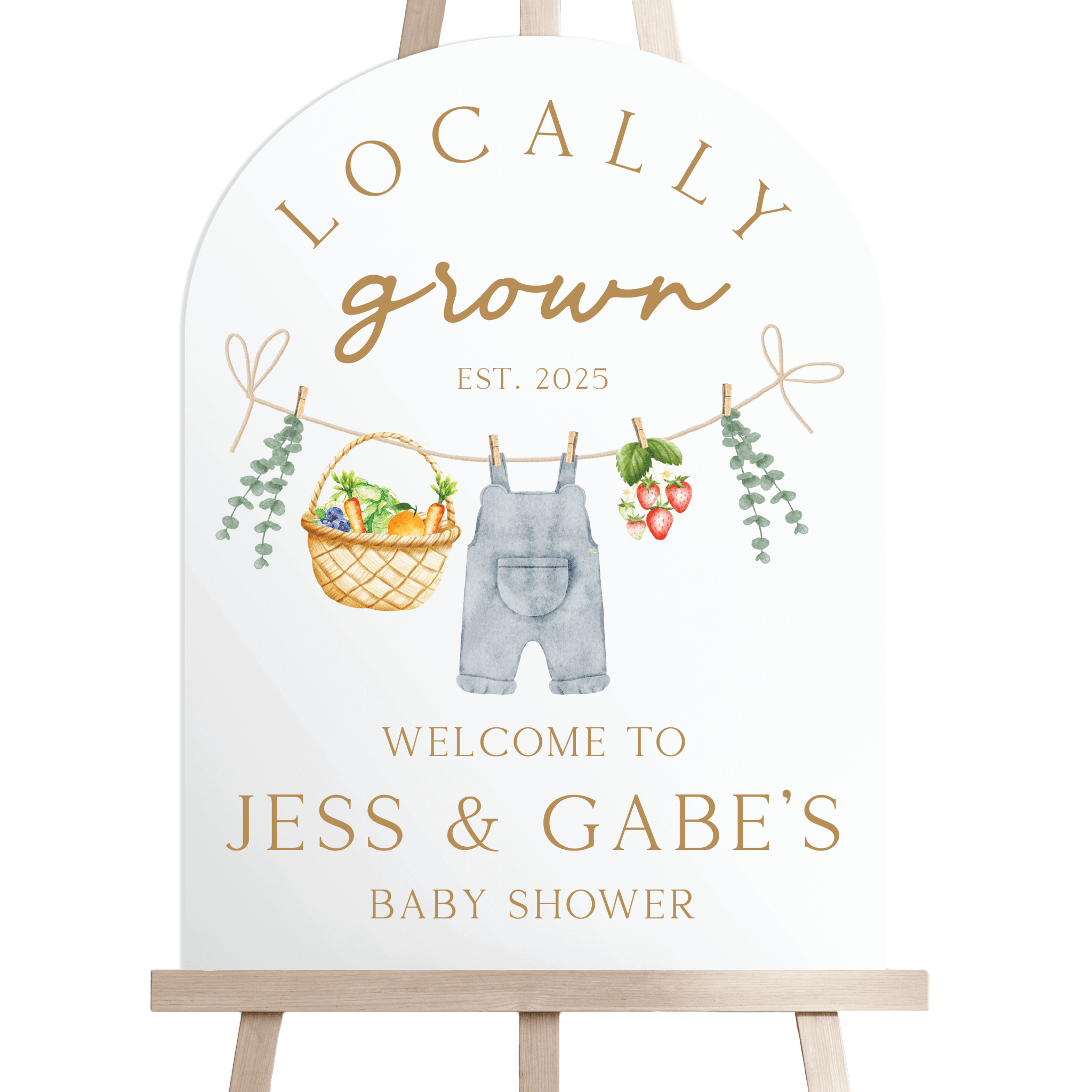 Wooden easel sign with "Locally Grown" text, overalls, garden basket, and hanging vegetables in gold and green, personalized with names and baby shower details.