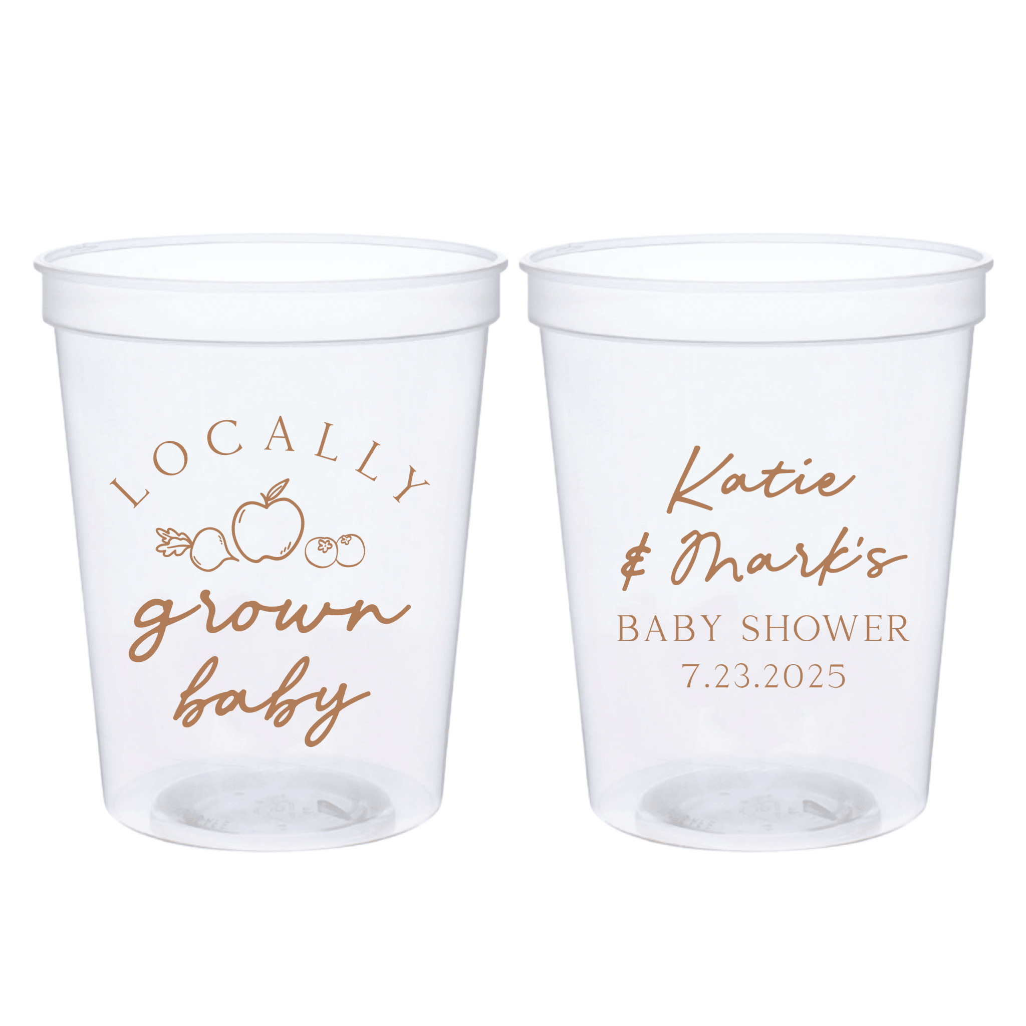 Pair of clear stadium cups with rose gold text, one reading "Locally grown baby" with apple design, the other personalized "Katie & Mark's Baby Shower 7.23.2025"