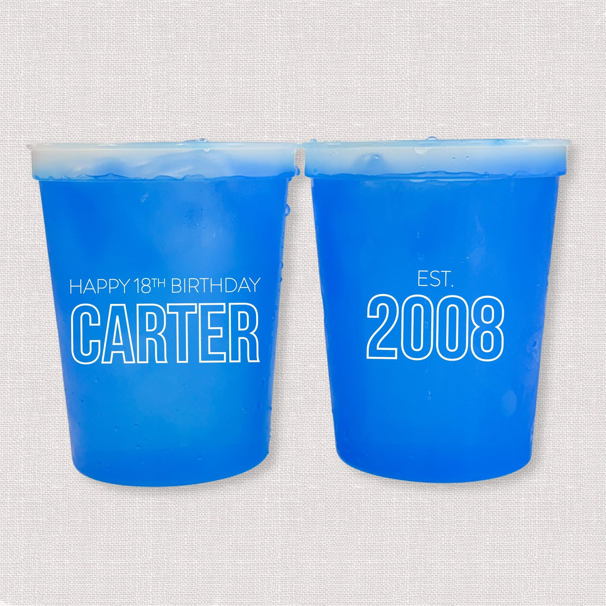 Blue color changing birthday stadium cups with Happy 18th Birthday Carter and Est. 2008 design